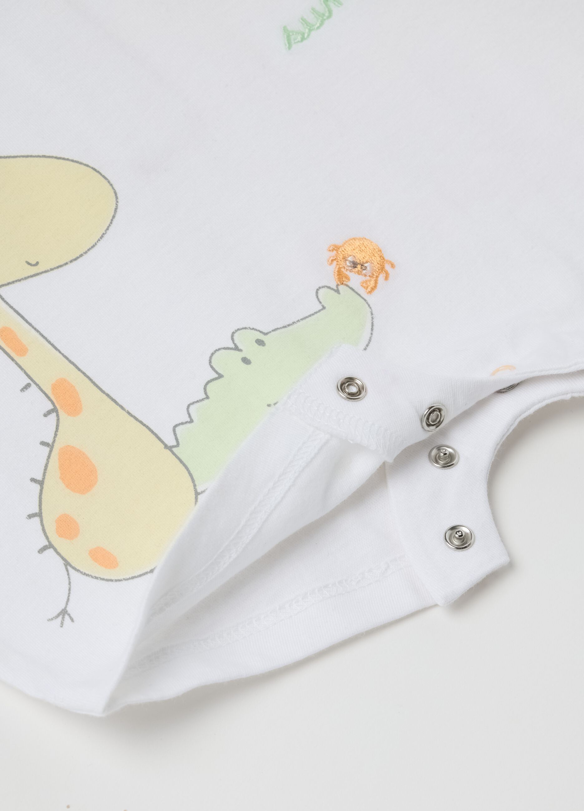 White romper suit in cotton