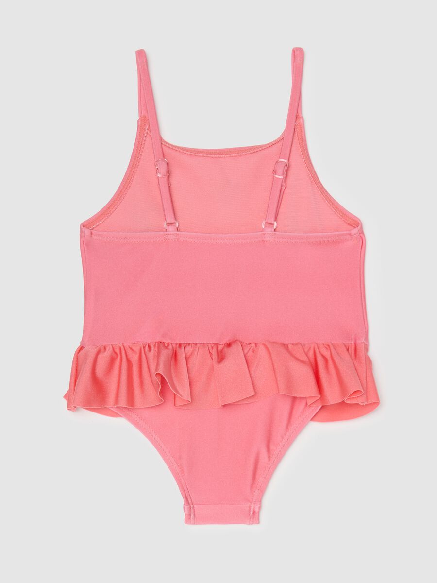 One-piece girls’ costume in stretch pink fabric_1