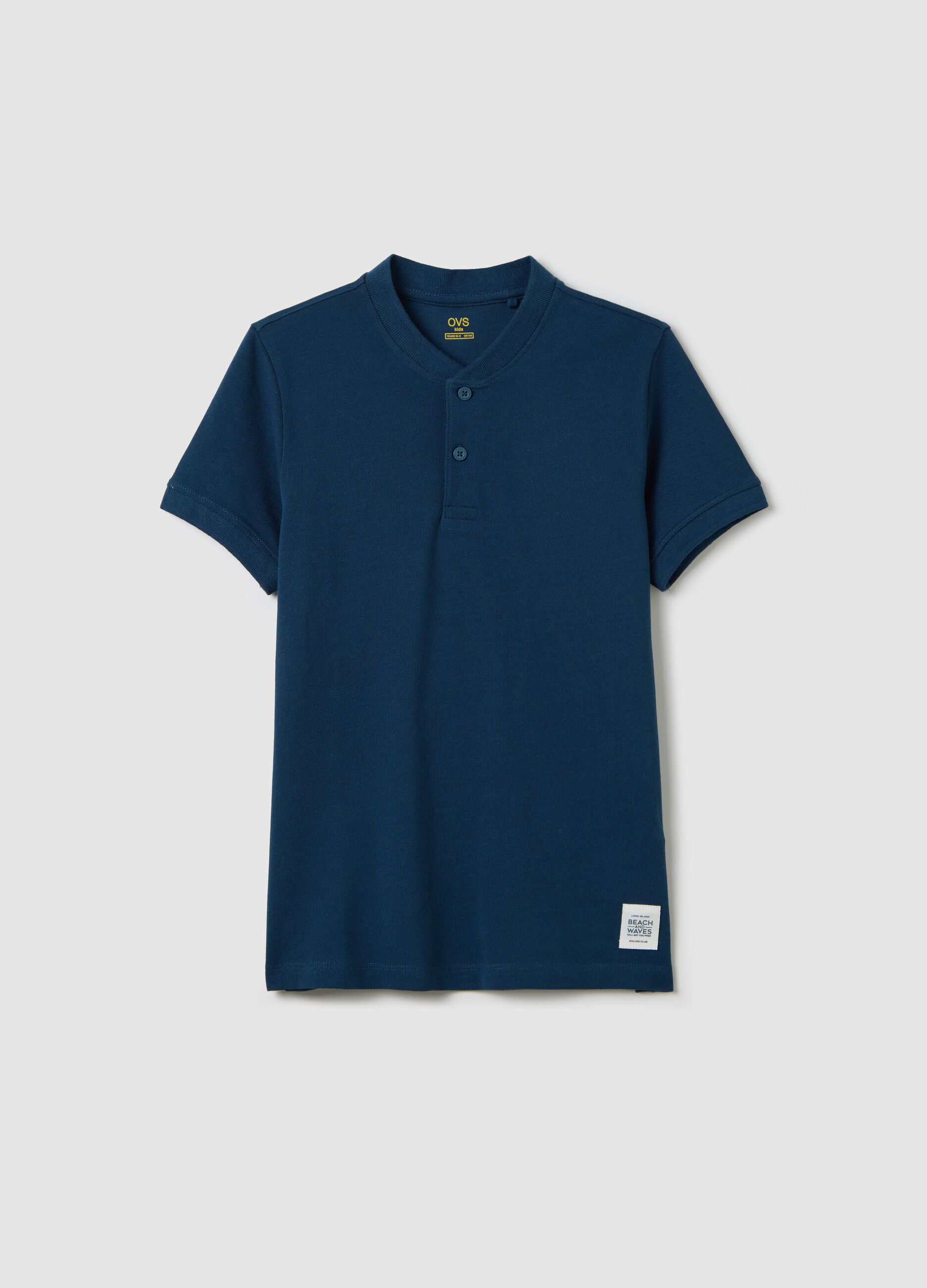 Boys’ blue polo shirt in 100% cotton with regular fit