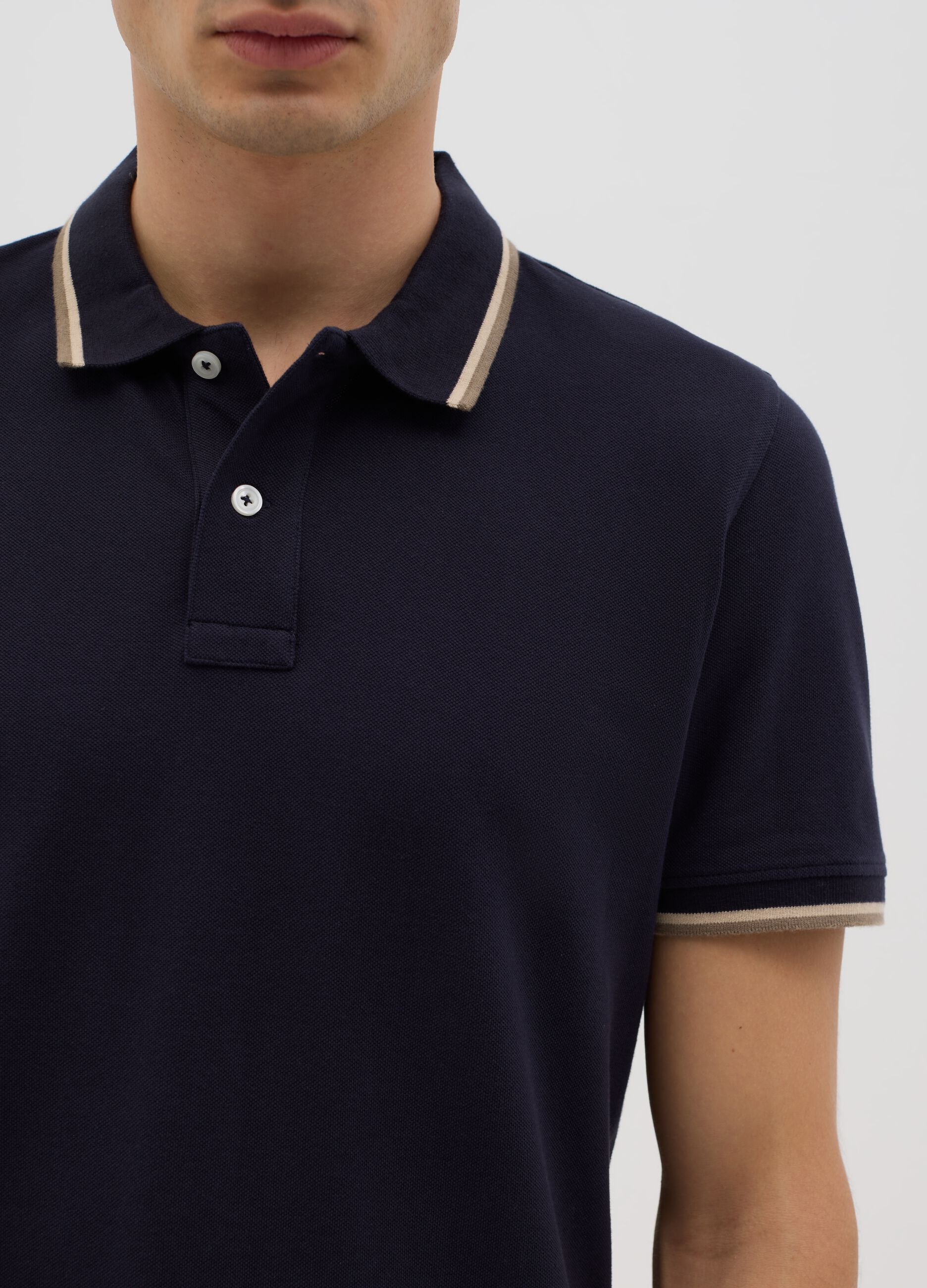 Blue short sleeve polo shirt in pure cotton