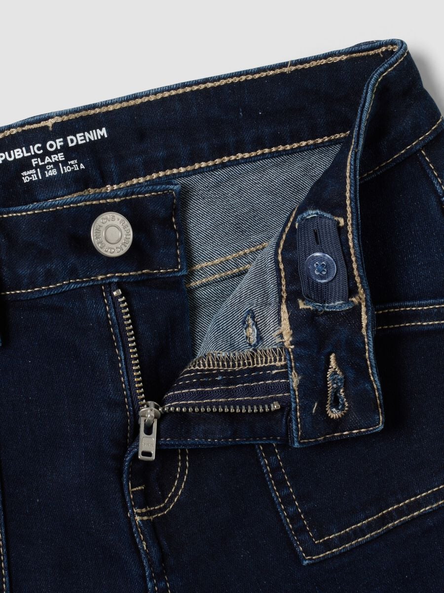 Jeans blu flare in cotone elasticizzato per ragazza_1