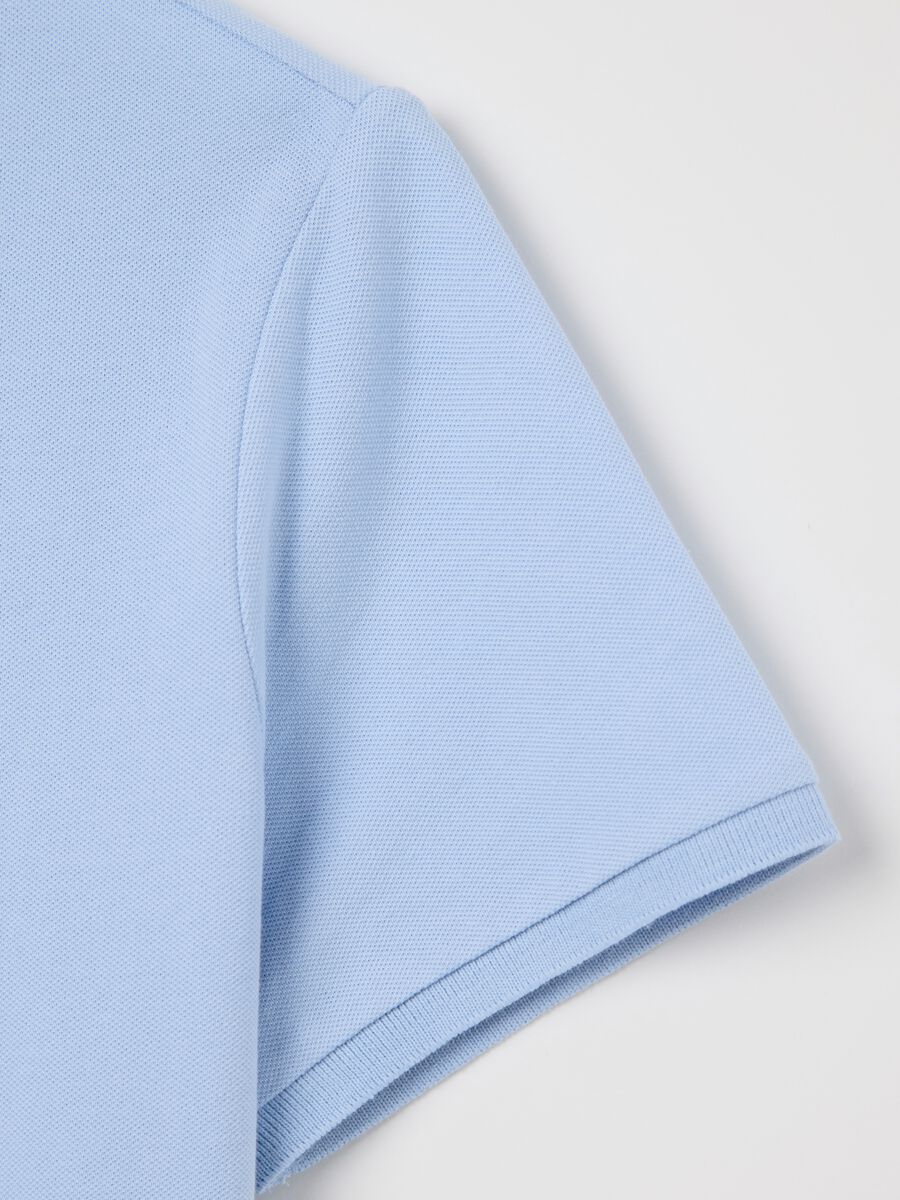Light blue short-sleeved polo shirt in piquet_5