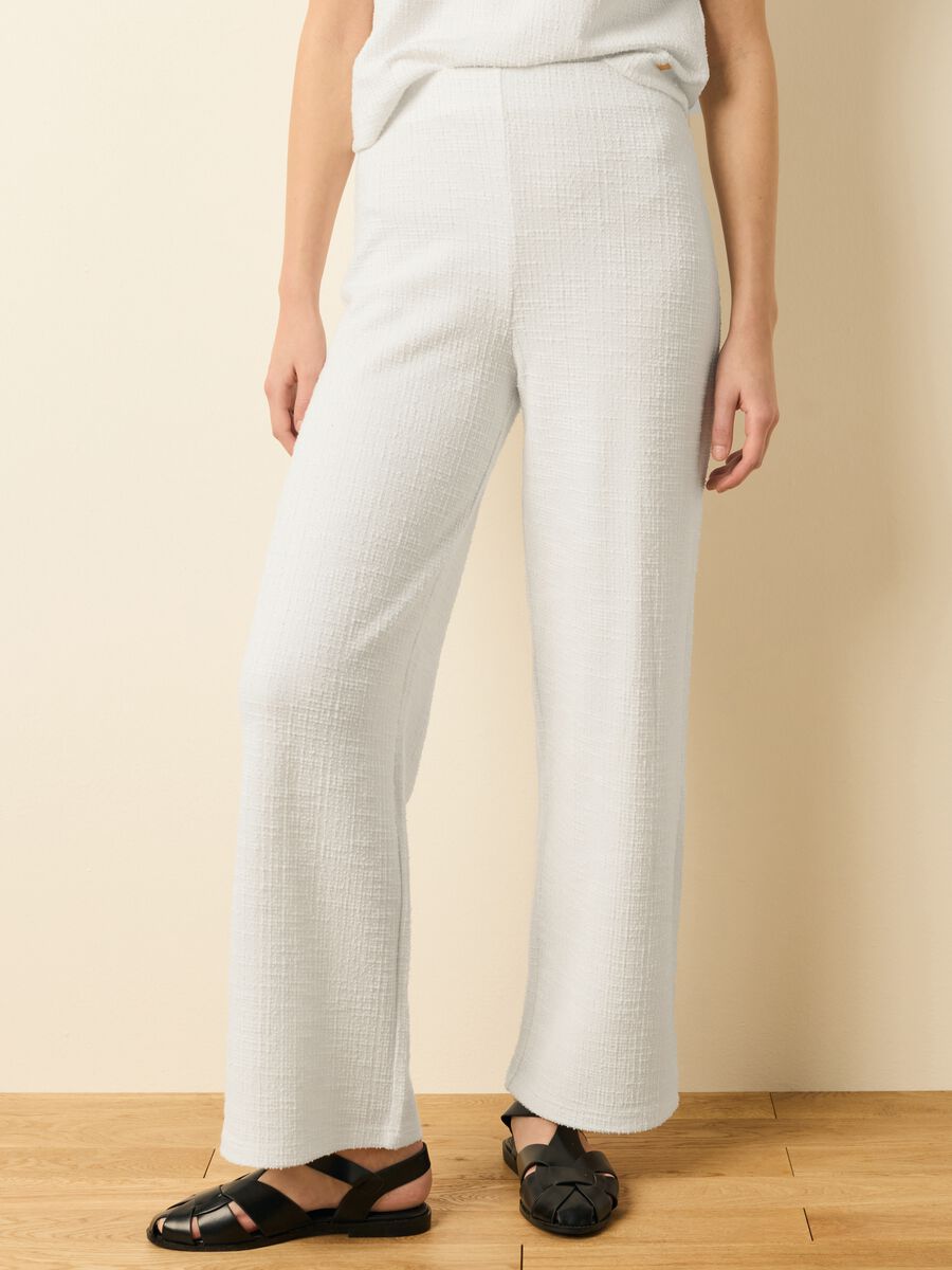 Wide-leg trousers with woven design_1