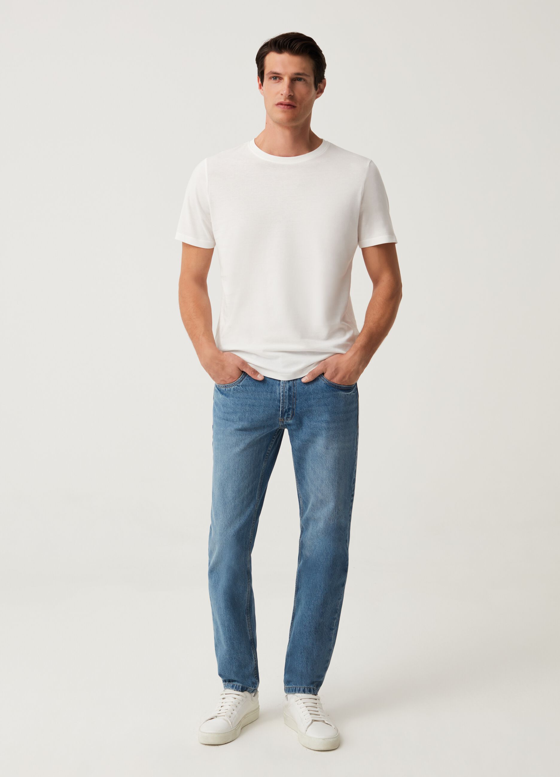 Jeans slim fit con scoloriture_0