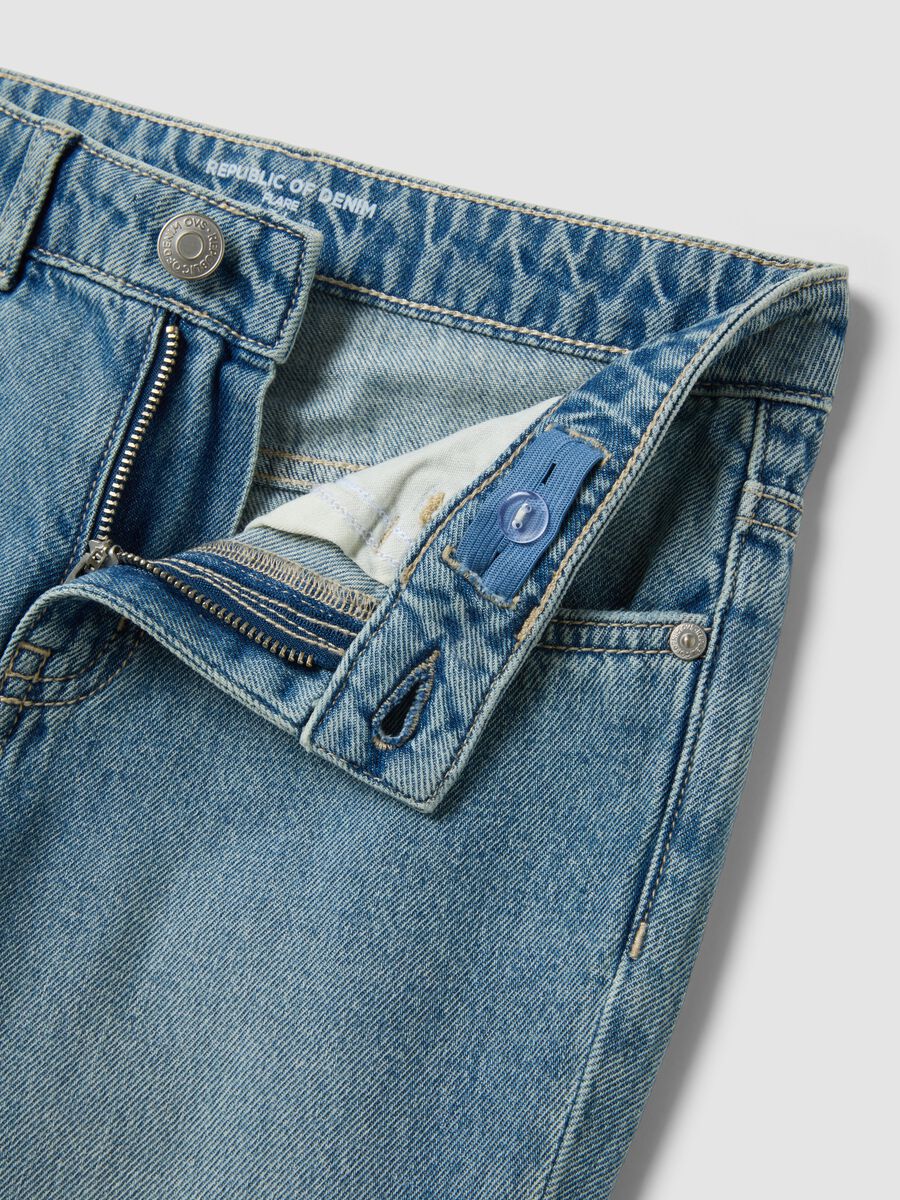 Jeans azzurri flare in puro cotone_1