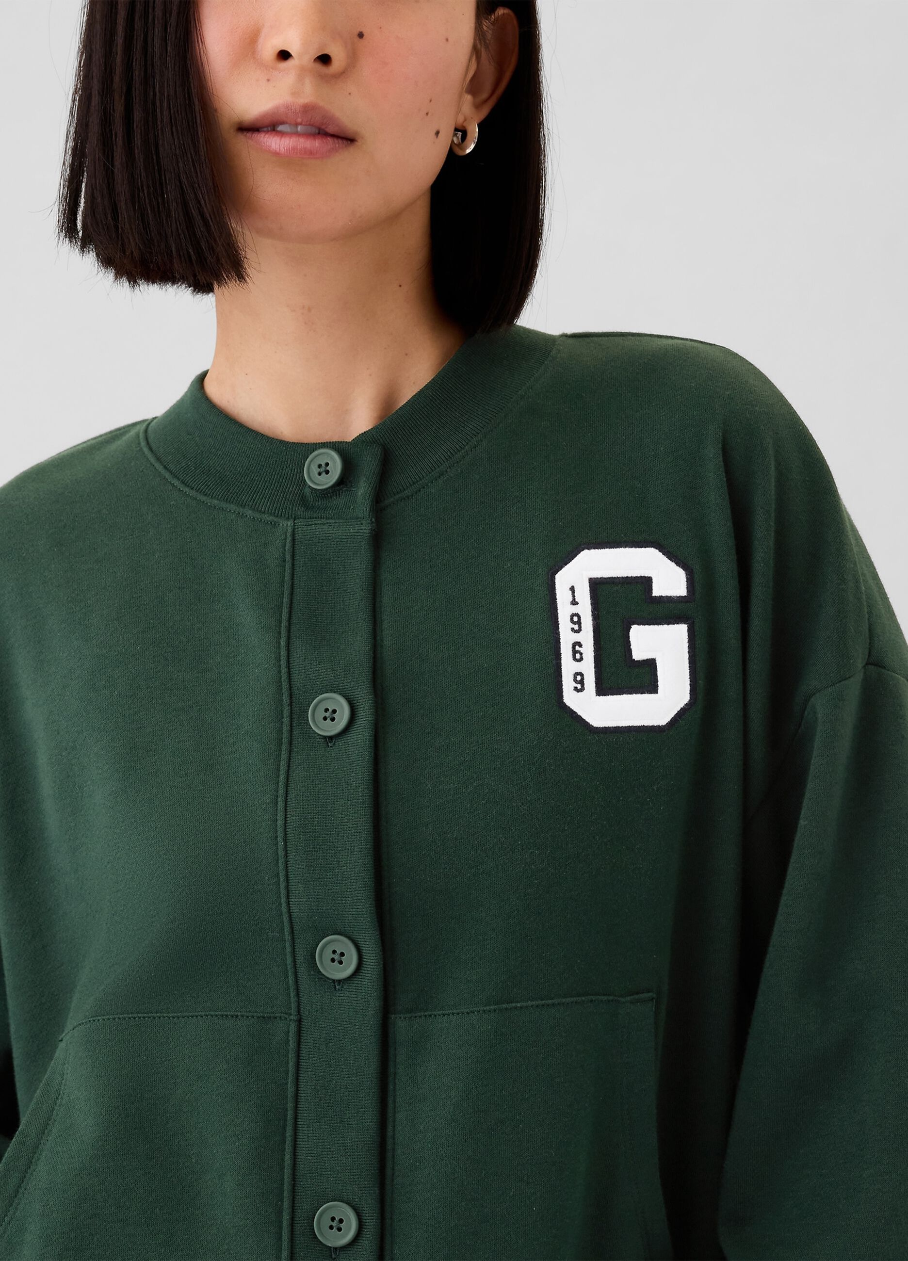 Oversized sweatshirt with buttons and logo embroidery