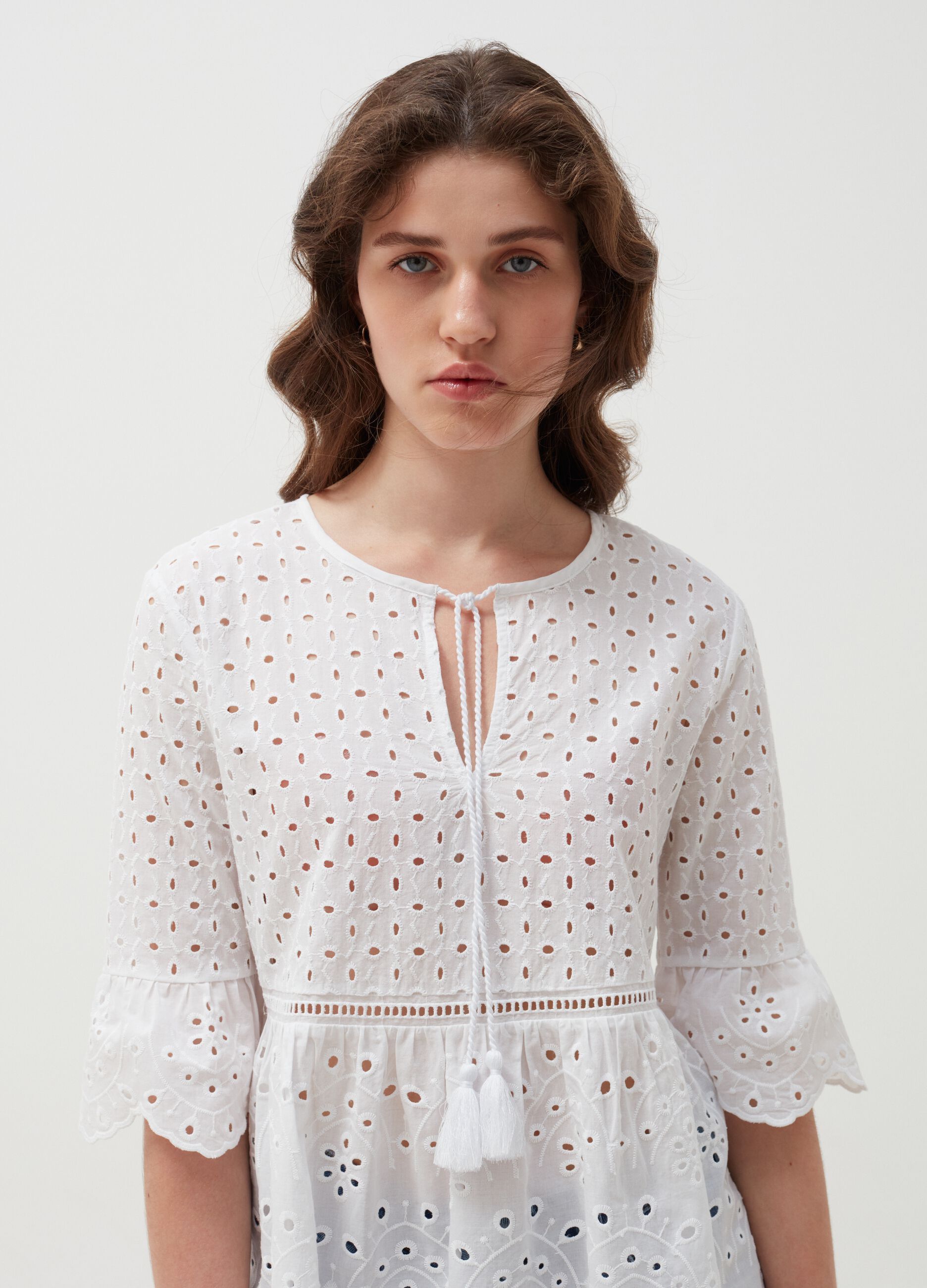 Broderie anglaise lace blouse with tassels