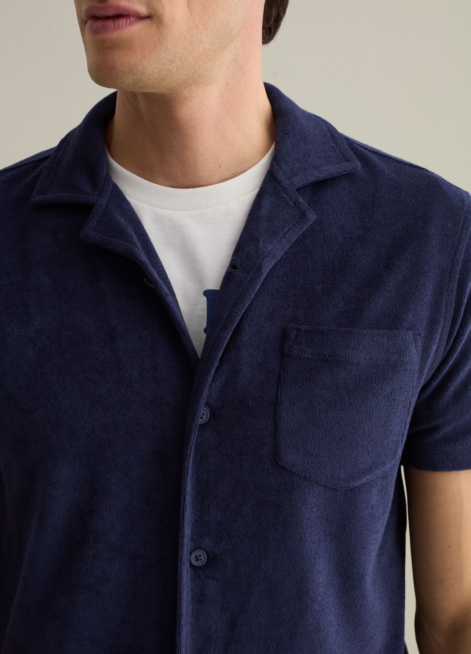 Polo shirt in chenille with pocket