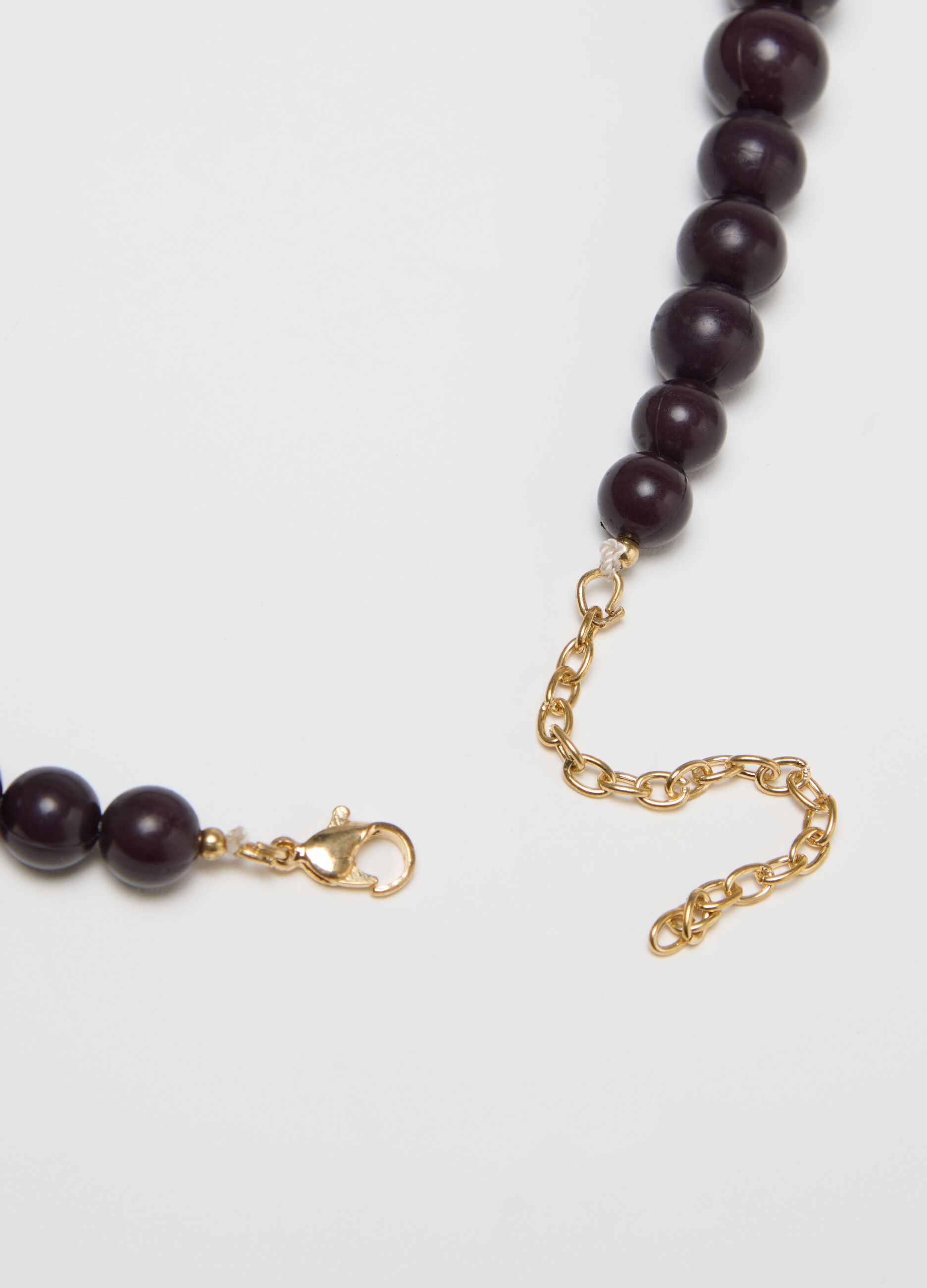 Black necklace with pearls and strands of beads