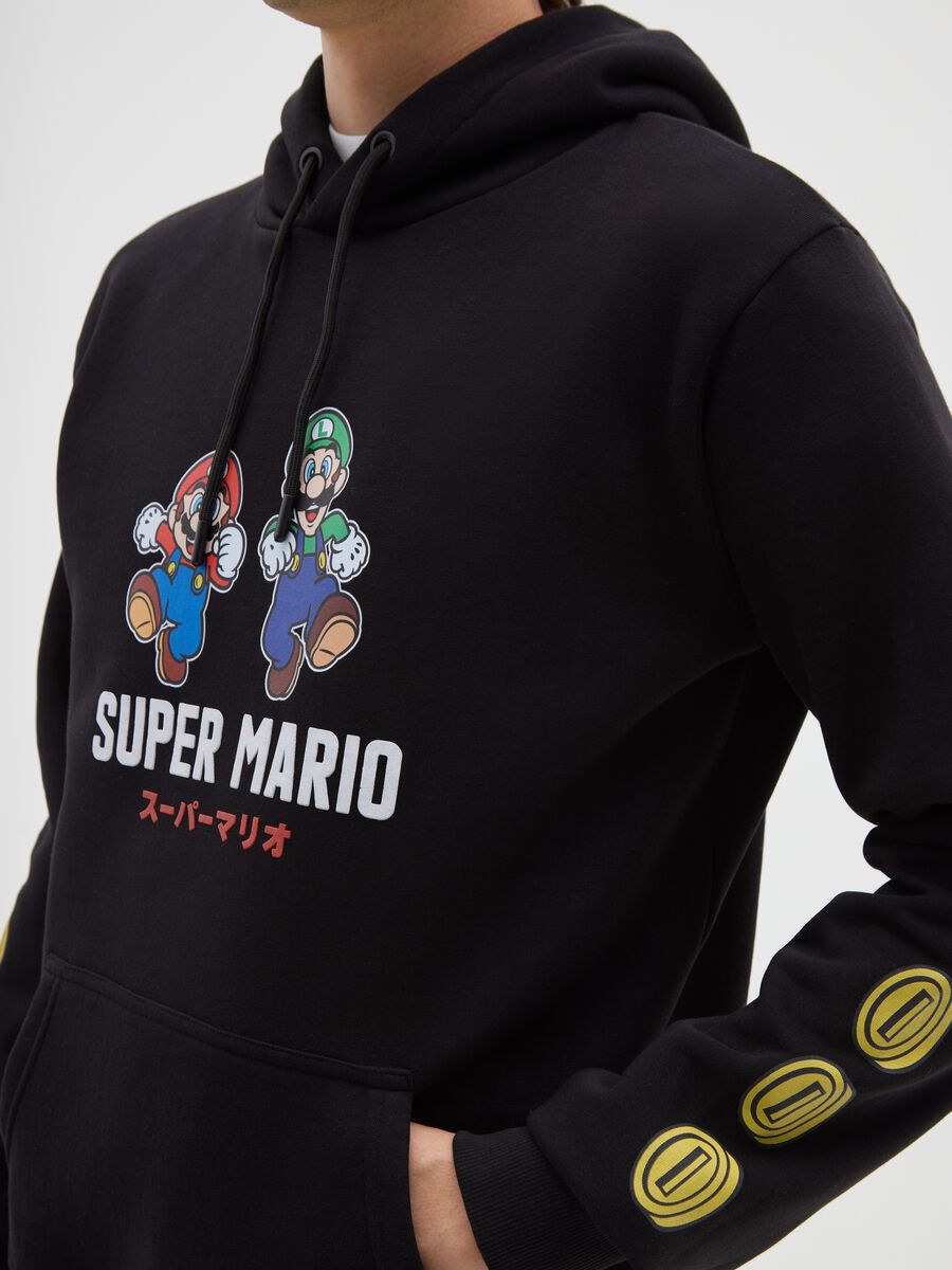 Felpa in misto cotone nera con cappuccio e stampa_3