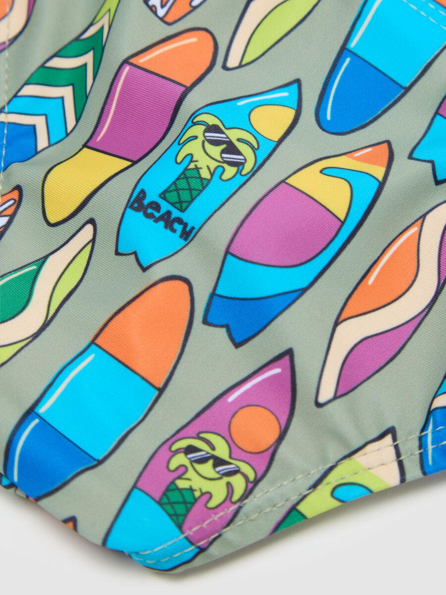 Boys’ swim briefs in multicoloured stretch fabric and with elastic waistband_3