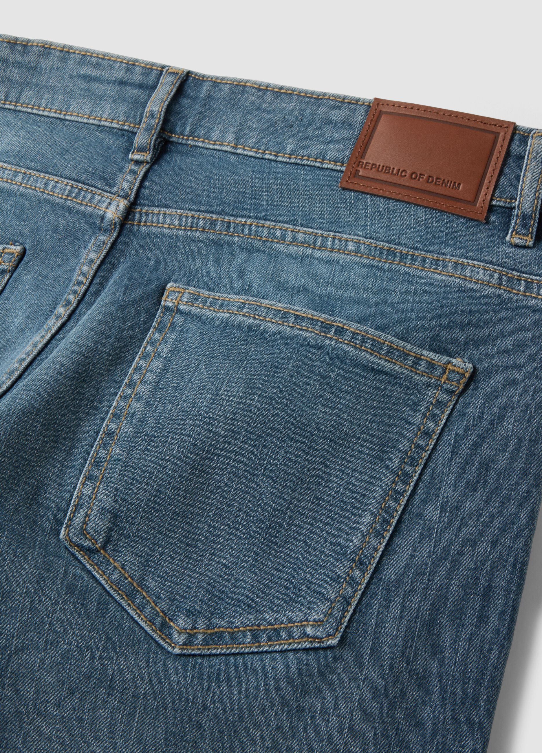 Mid-wash slim-fit stretch cotton jeans