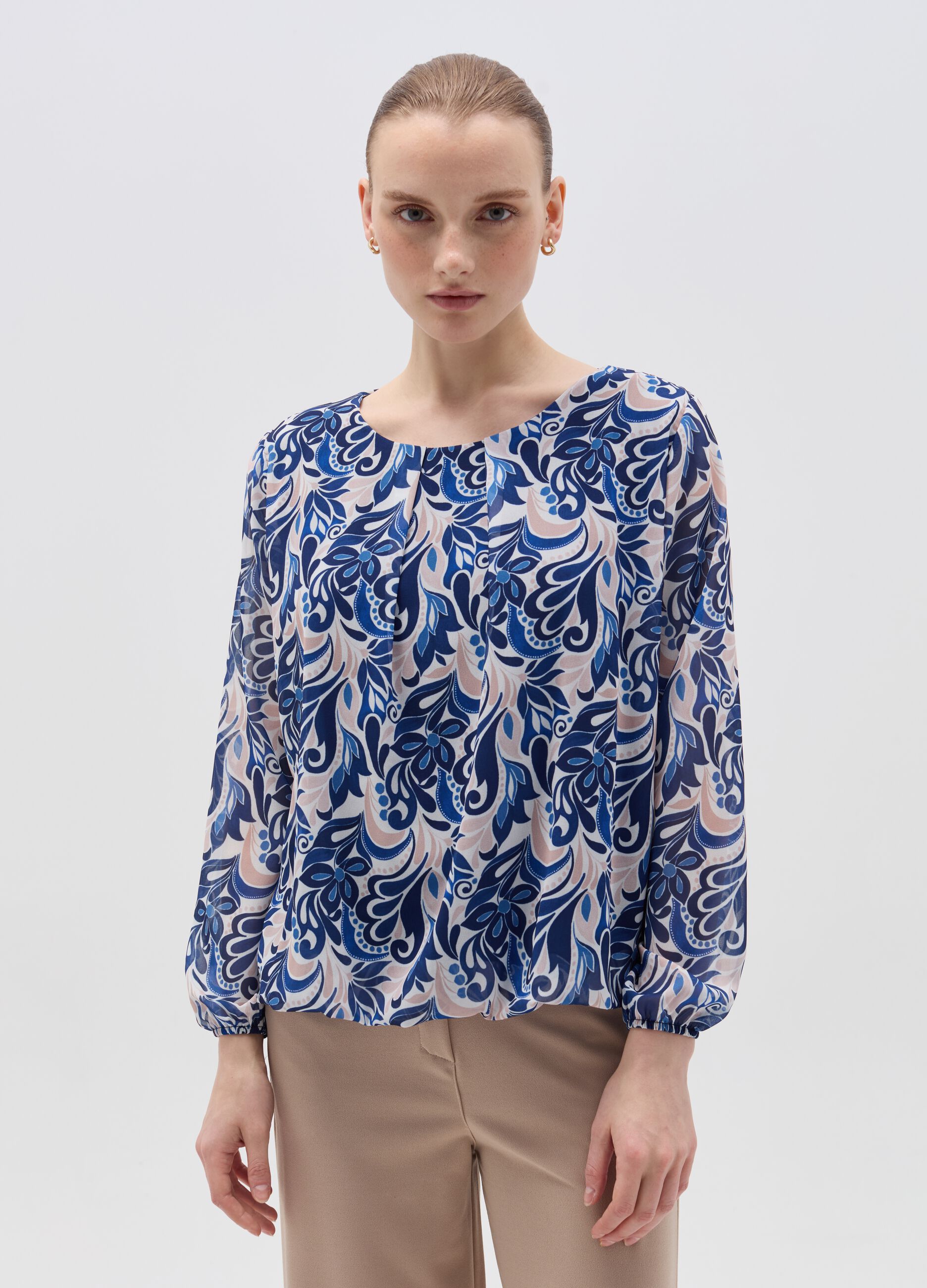 Blusa a maniche lunghe fantasia