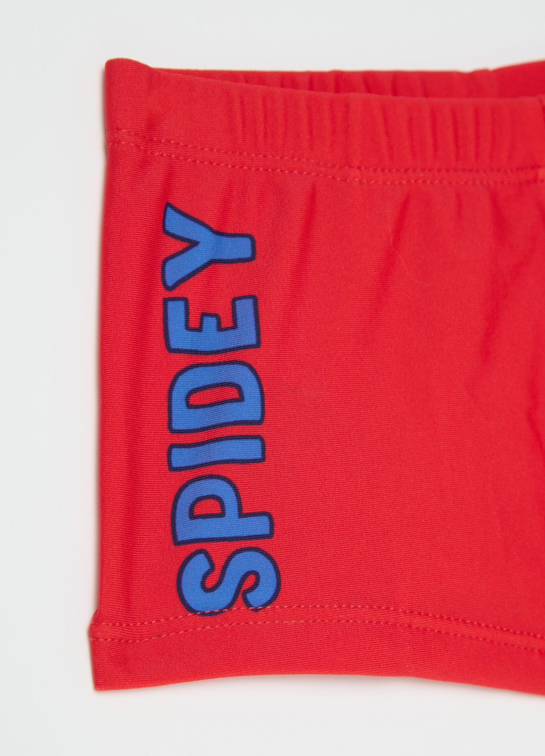 Boys’ swim briefs in red stretch fabric