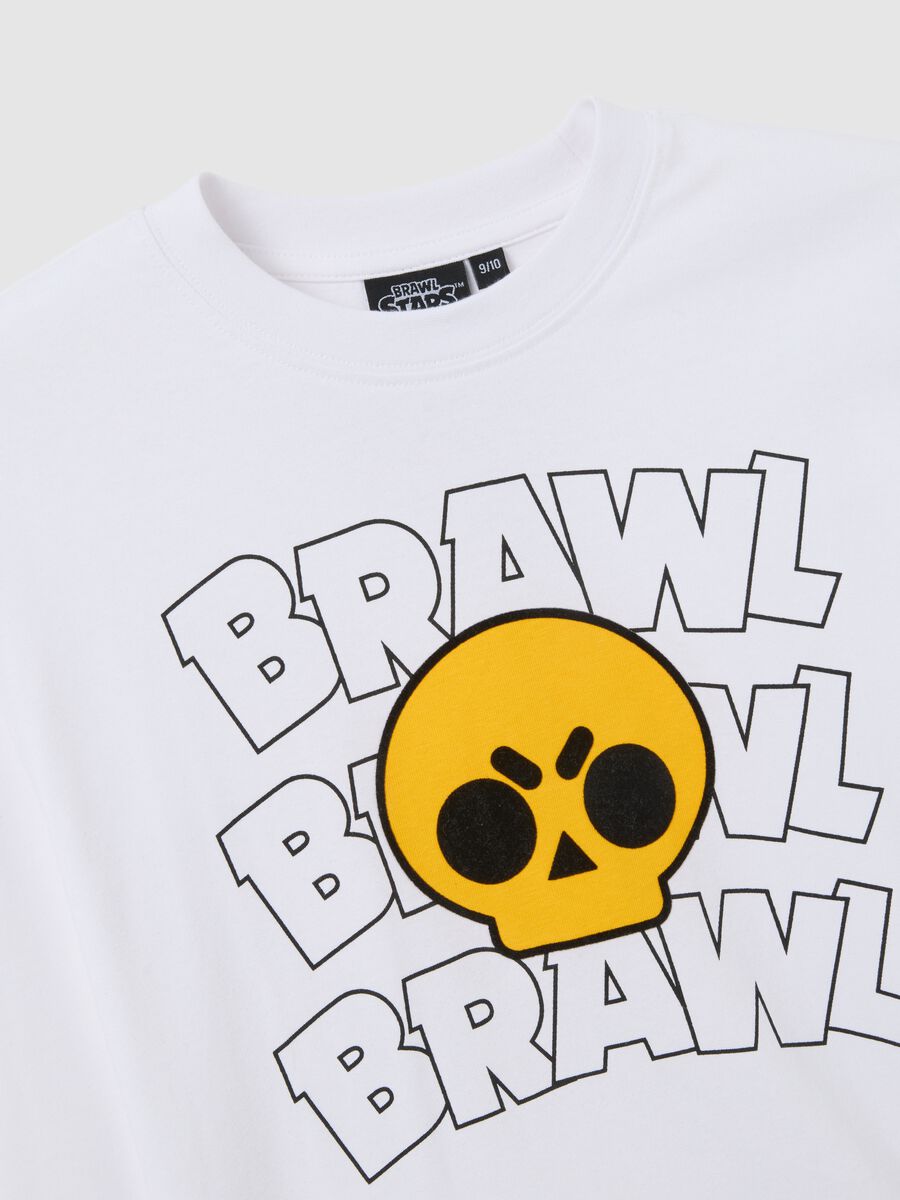 T-shirt bianca da bambino in puro cotone vestibilità over con stampe_3