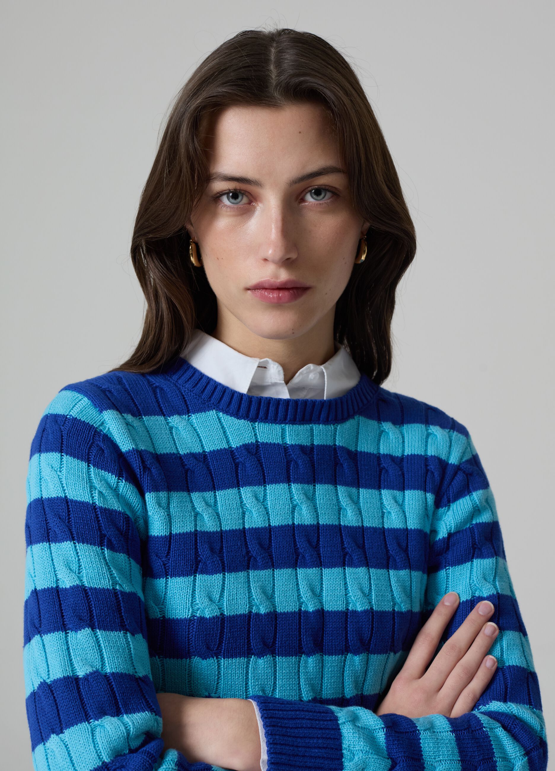 Striped pullover with cable-knit design