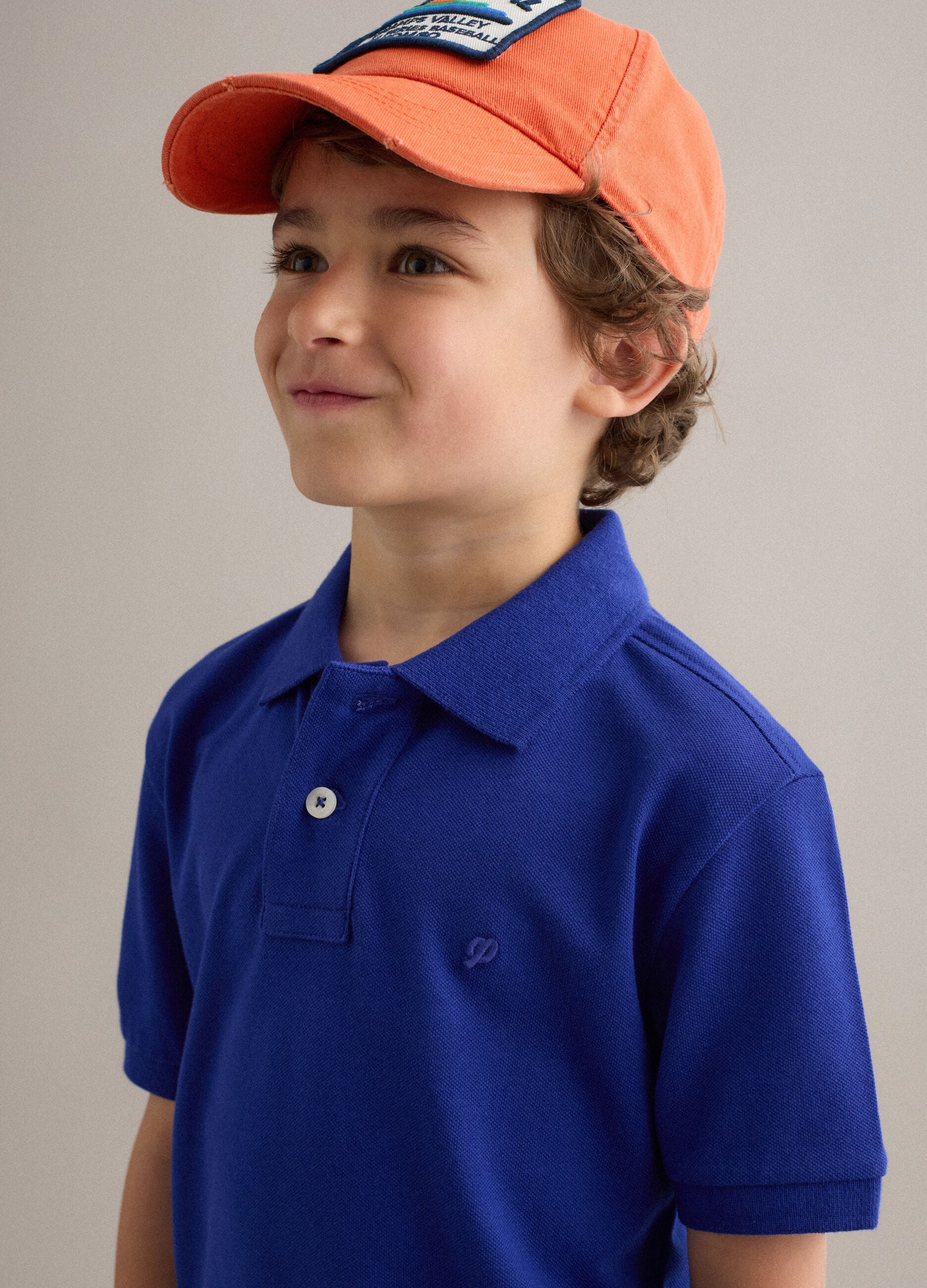 Polo in cotone elasticizzato blu da bambino regular fit