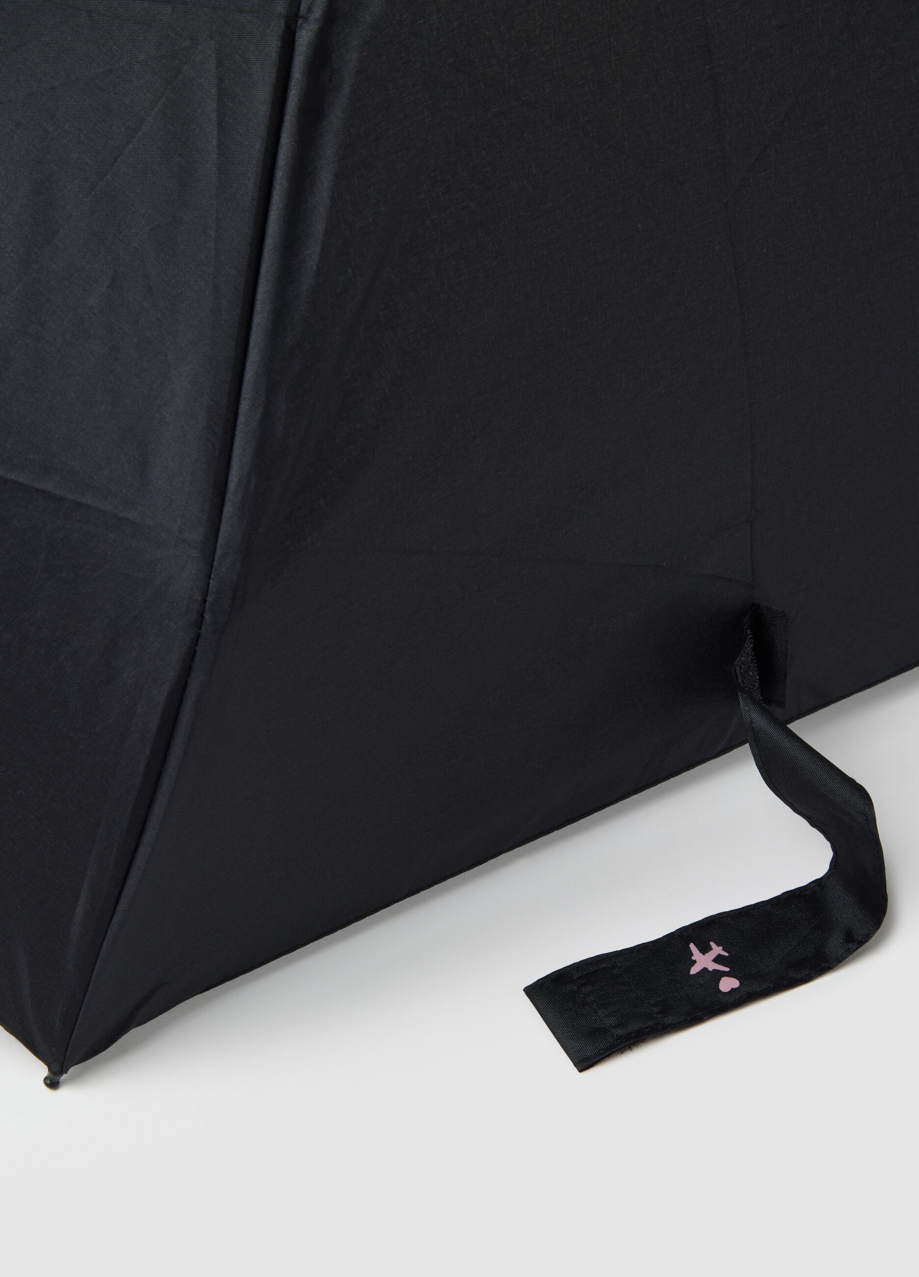 Black umbrella with writing