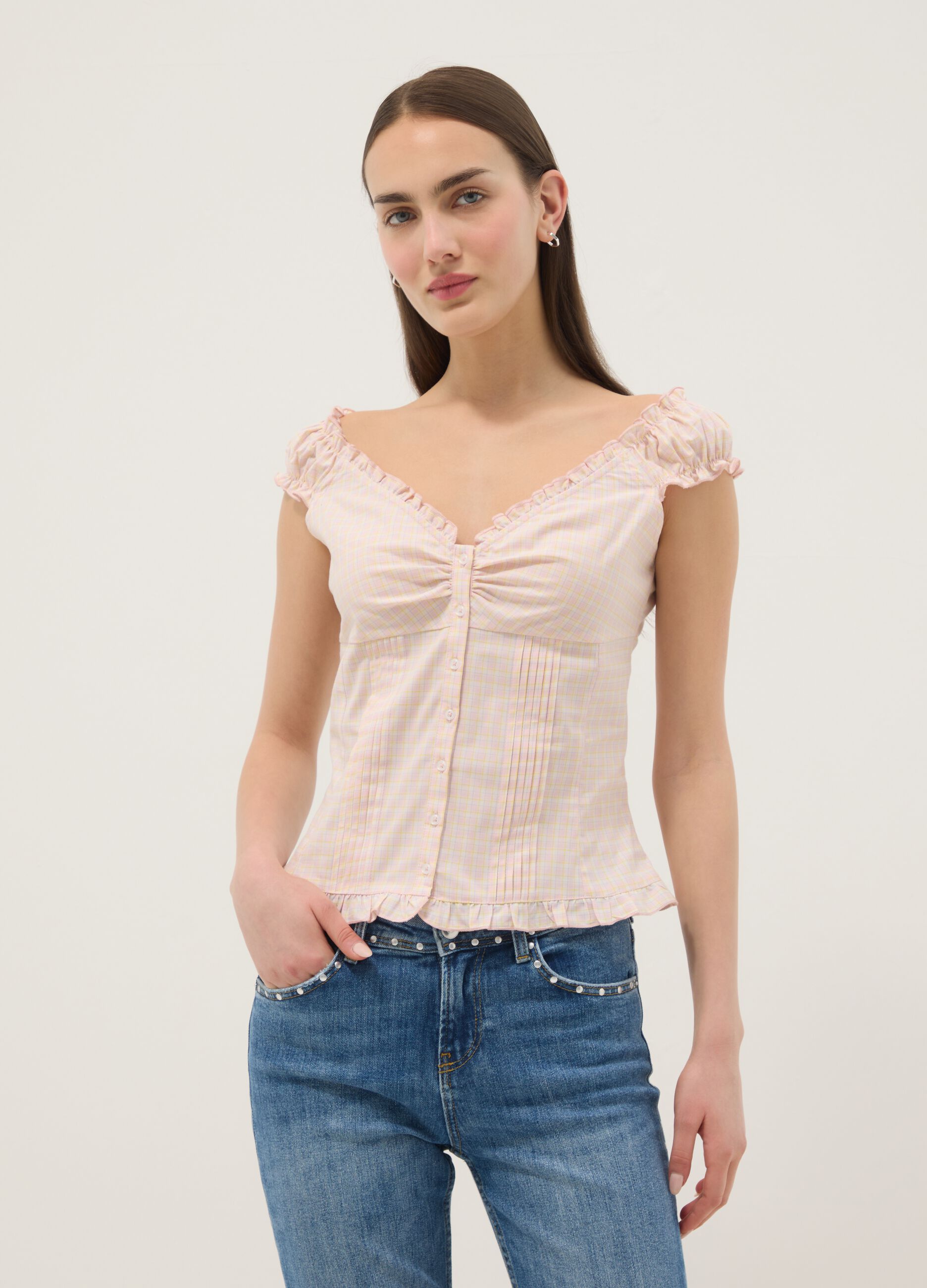 Pink organic cotton blouse with buttons and ruffles