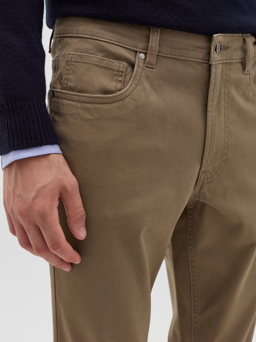 Trousers with five pockets and couture stitched weave_2