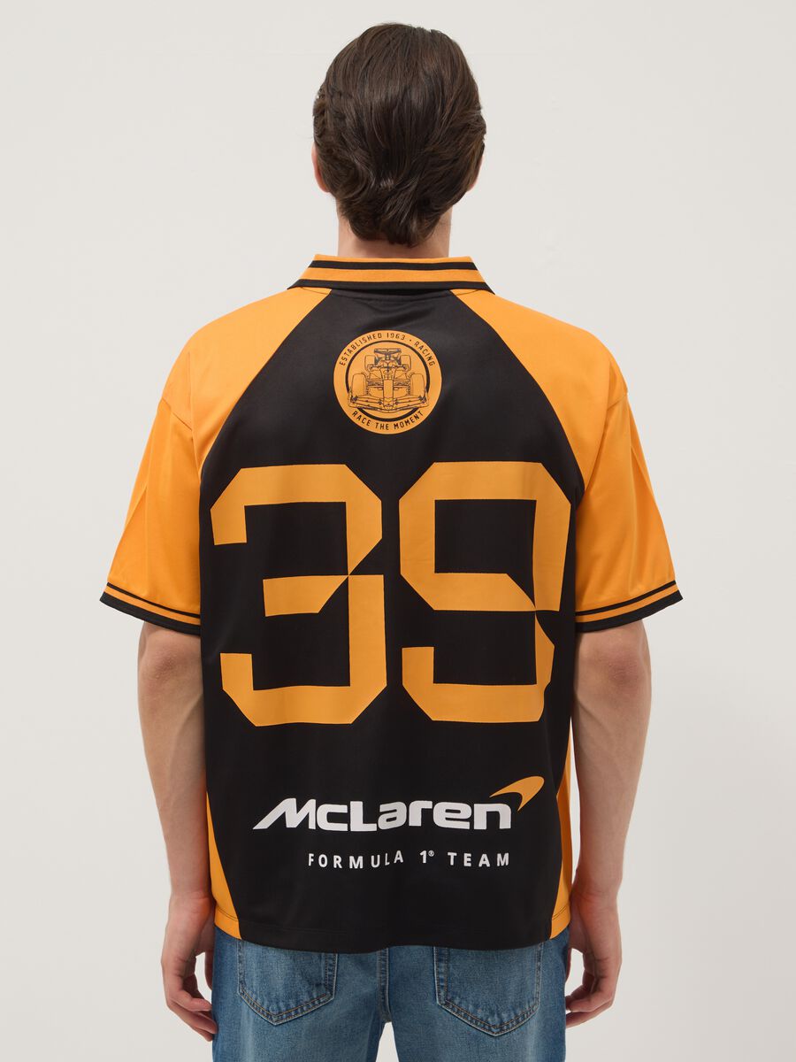 Black and orange oversized McLaren logo polo shirt_3