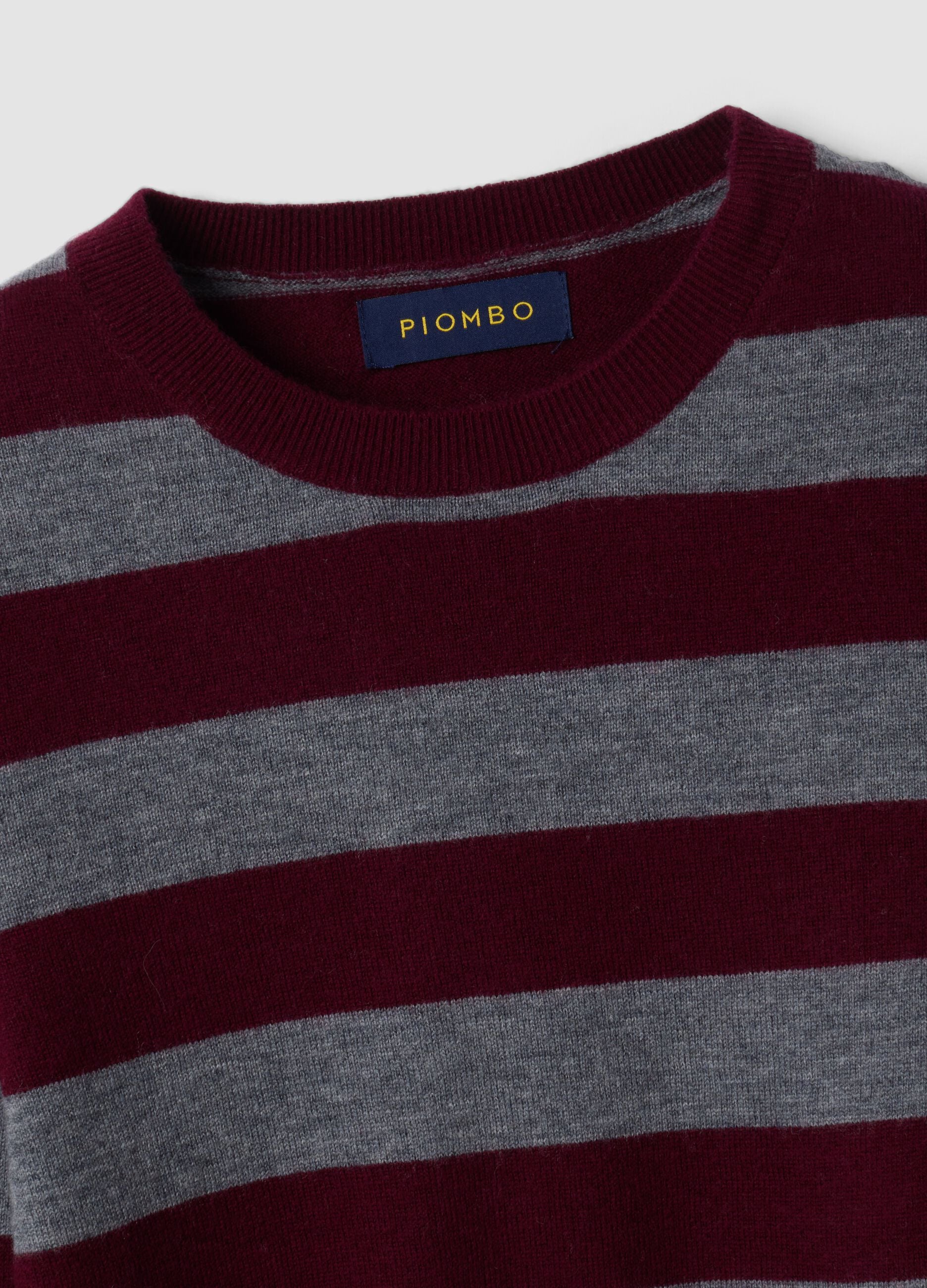 Maglia rossa in pura lana a righe con girocollo