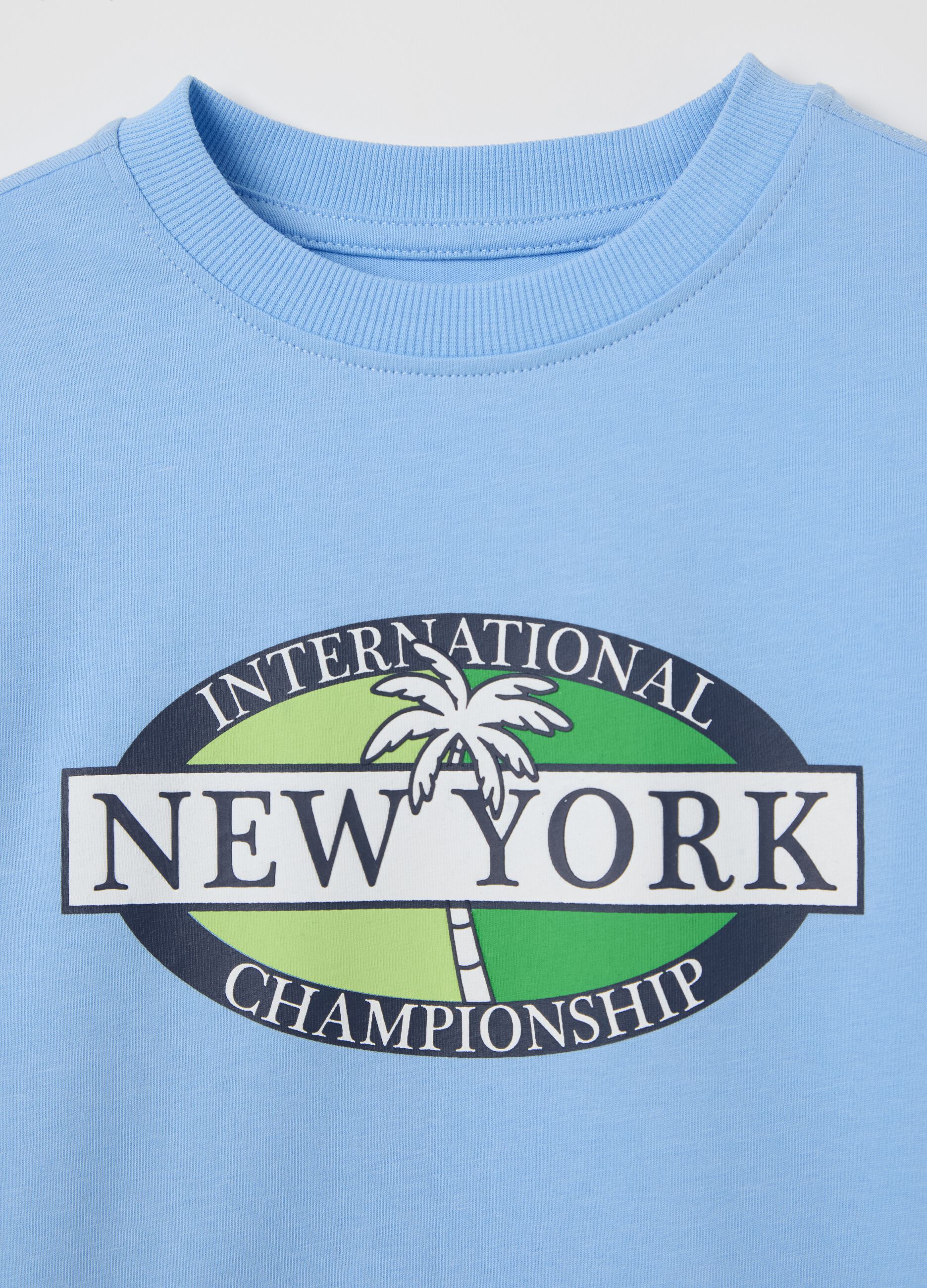 Light blue cotton T-shirt with lettering print