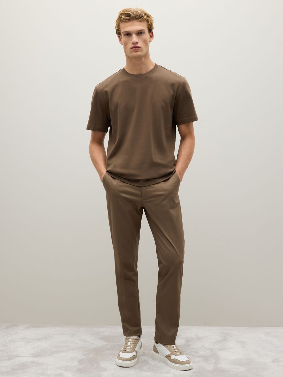 Brown stretch cotton trousers with zip and button_0
