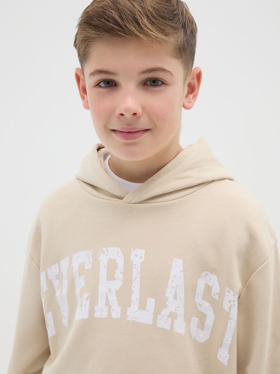 Beige cotton blend hoodie for boys_1