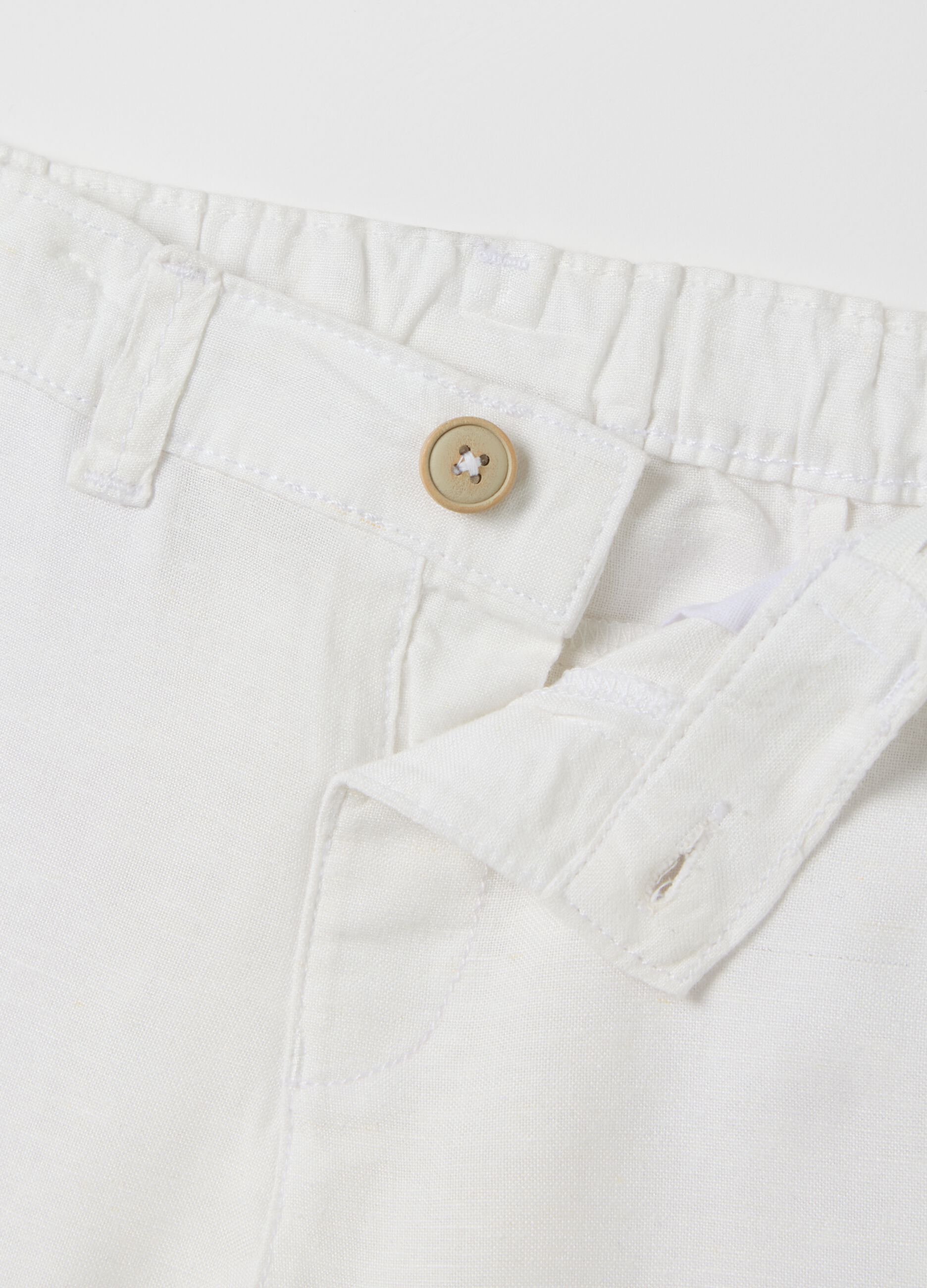 White shorts with striped braces