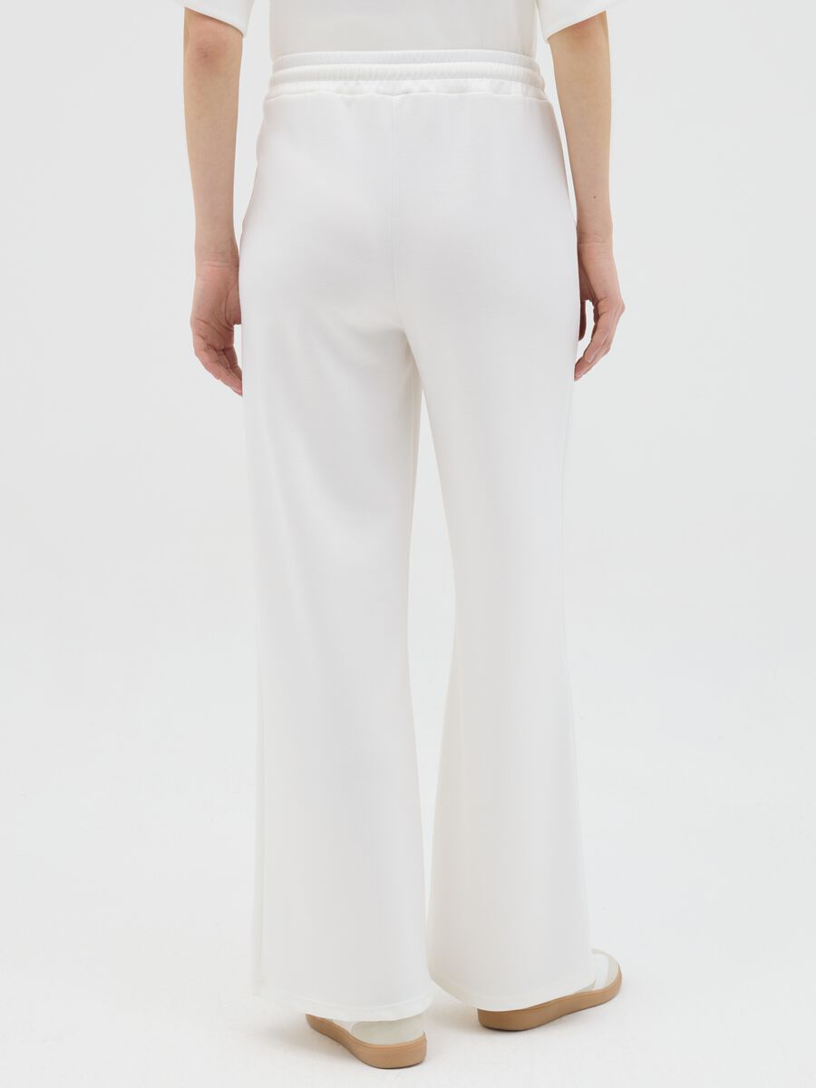 White palazzo trousers in stretch fabric_3