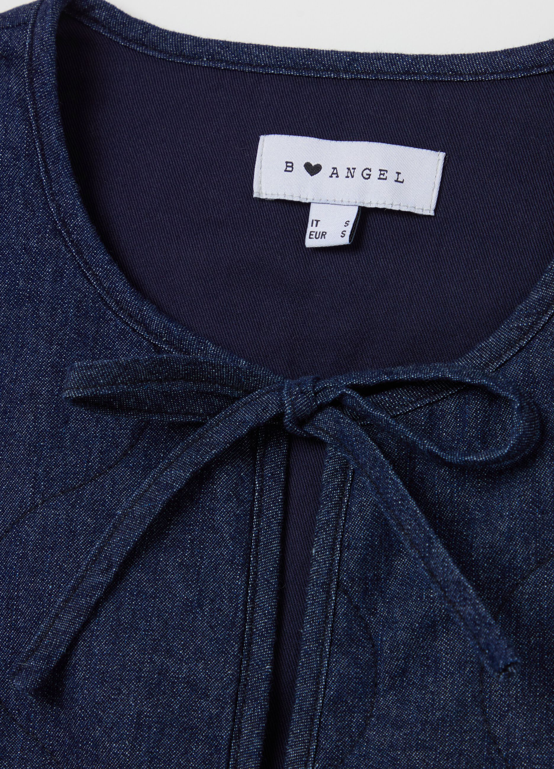 Padded gilet in denim with laces