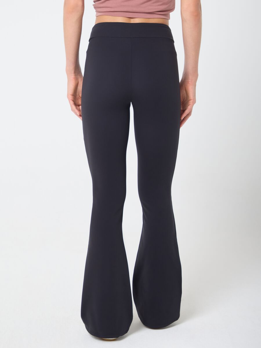 Flared leggings in stretchy technical fabric with zip pockets ALTAVIA STUDIO_2