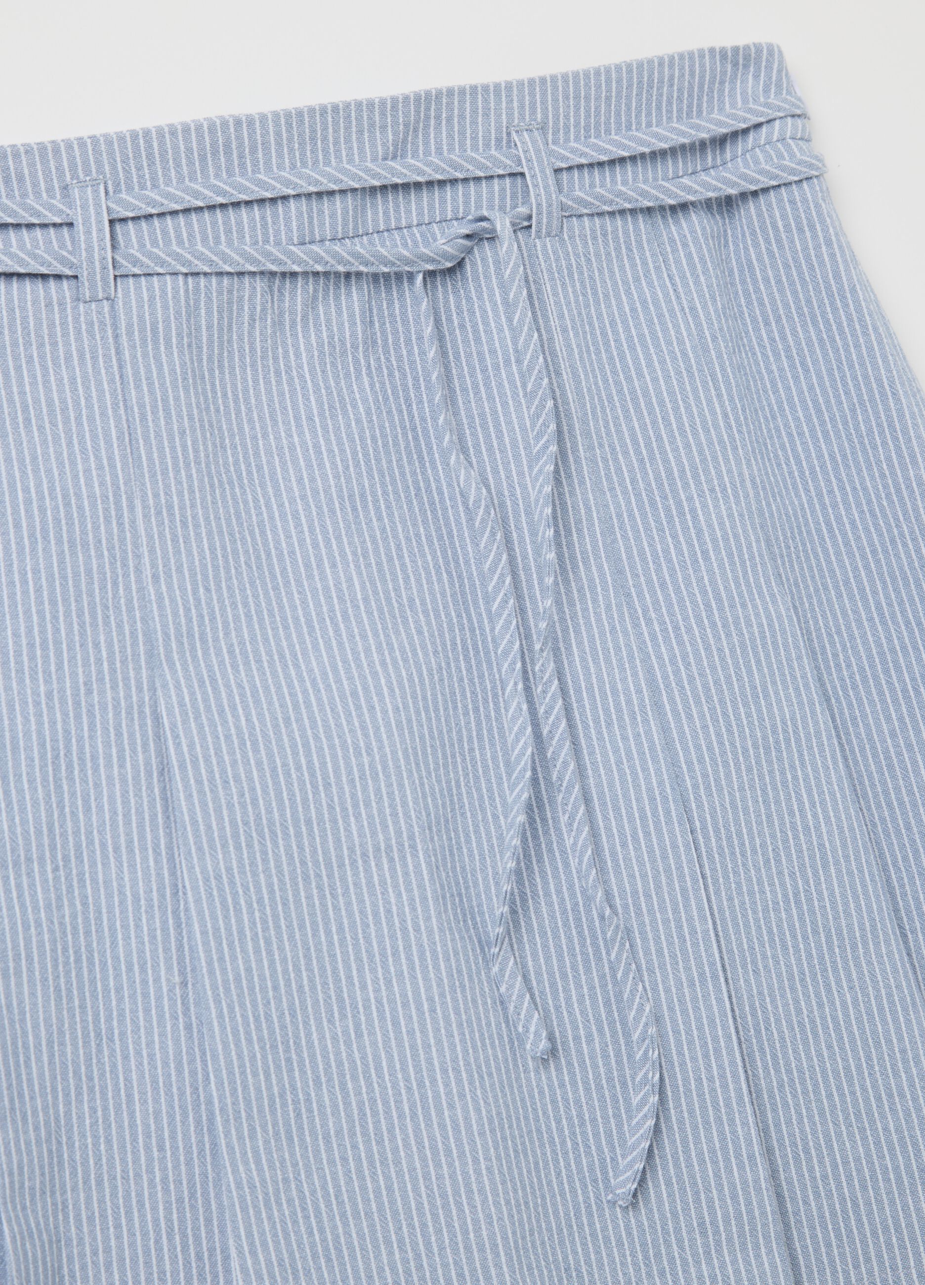 White and light blue miniskirt in striped cotton