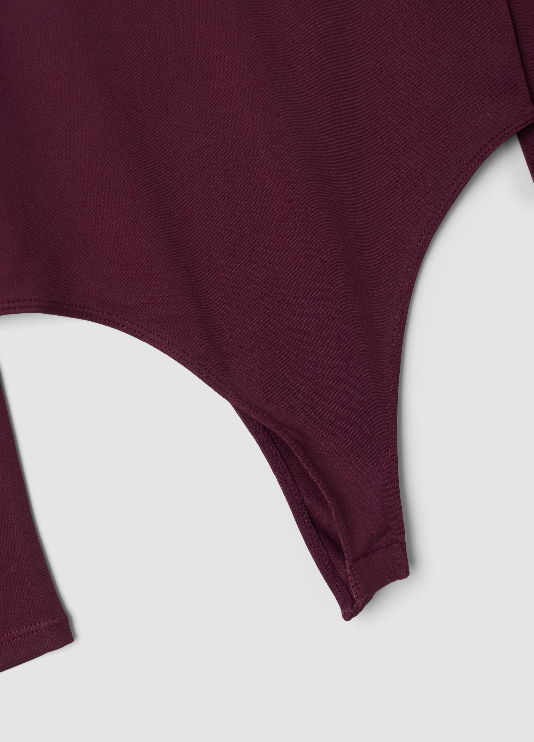 Purple fitted stretch bodysuit with crew neck