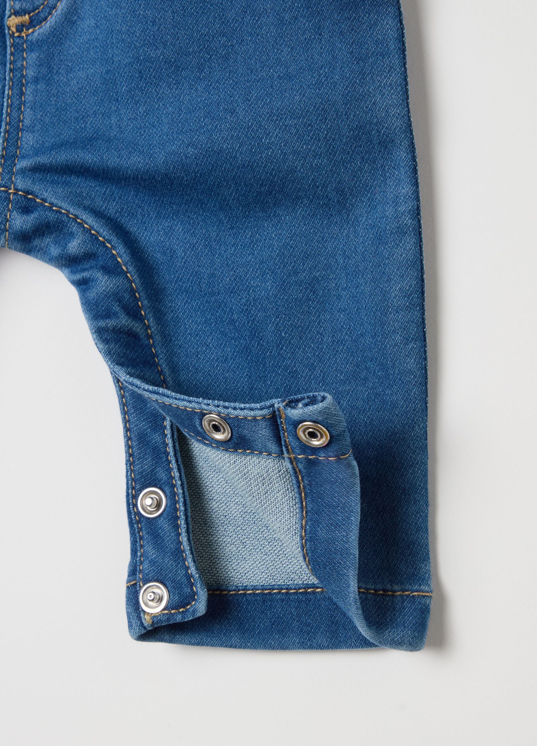 Denim dungarees with pocket