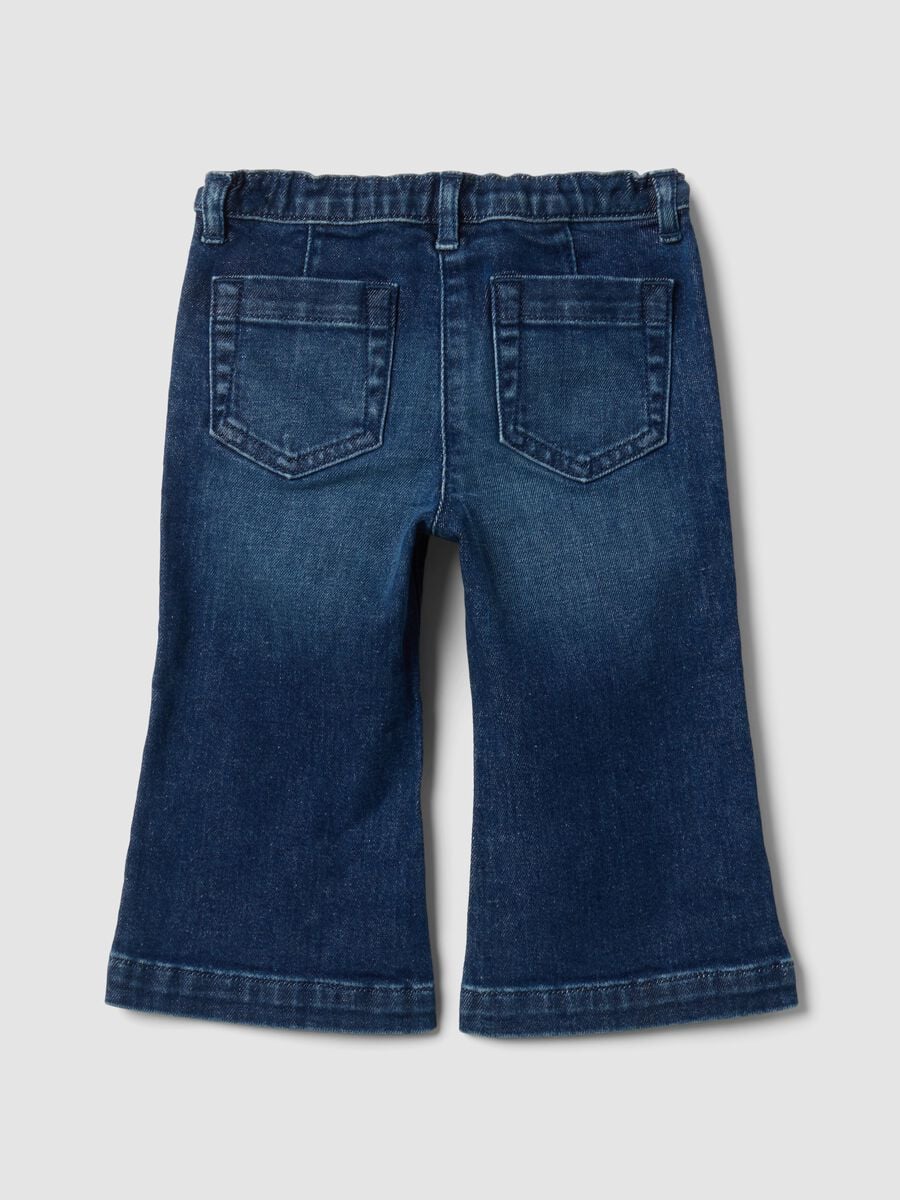 Blue flared stretch-cotton jeans with teddy bear button for baby girl_1