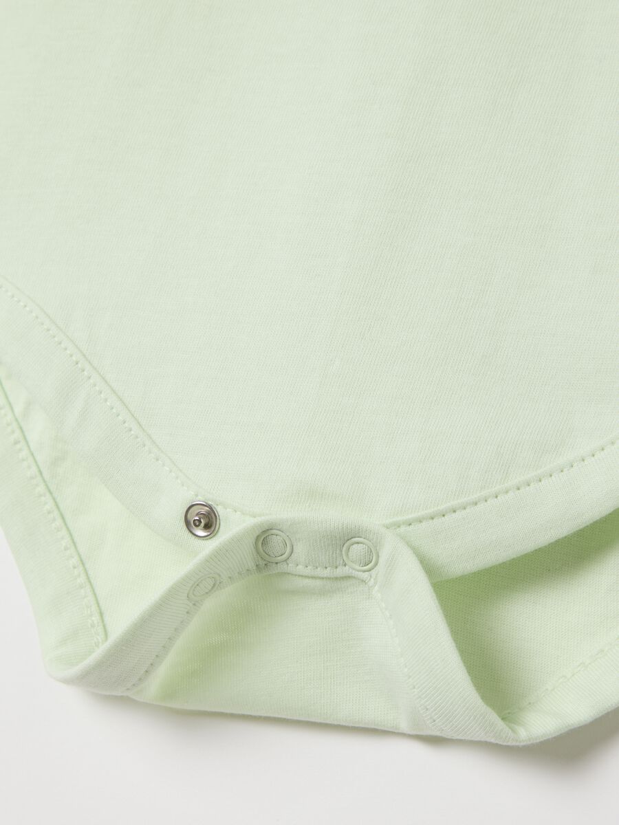 Green and orange colourblock bodysuit in organic cotton_3