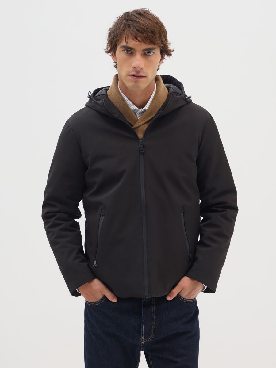 Giacca imbottita in tessuto elasticizzato nera_0