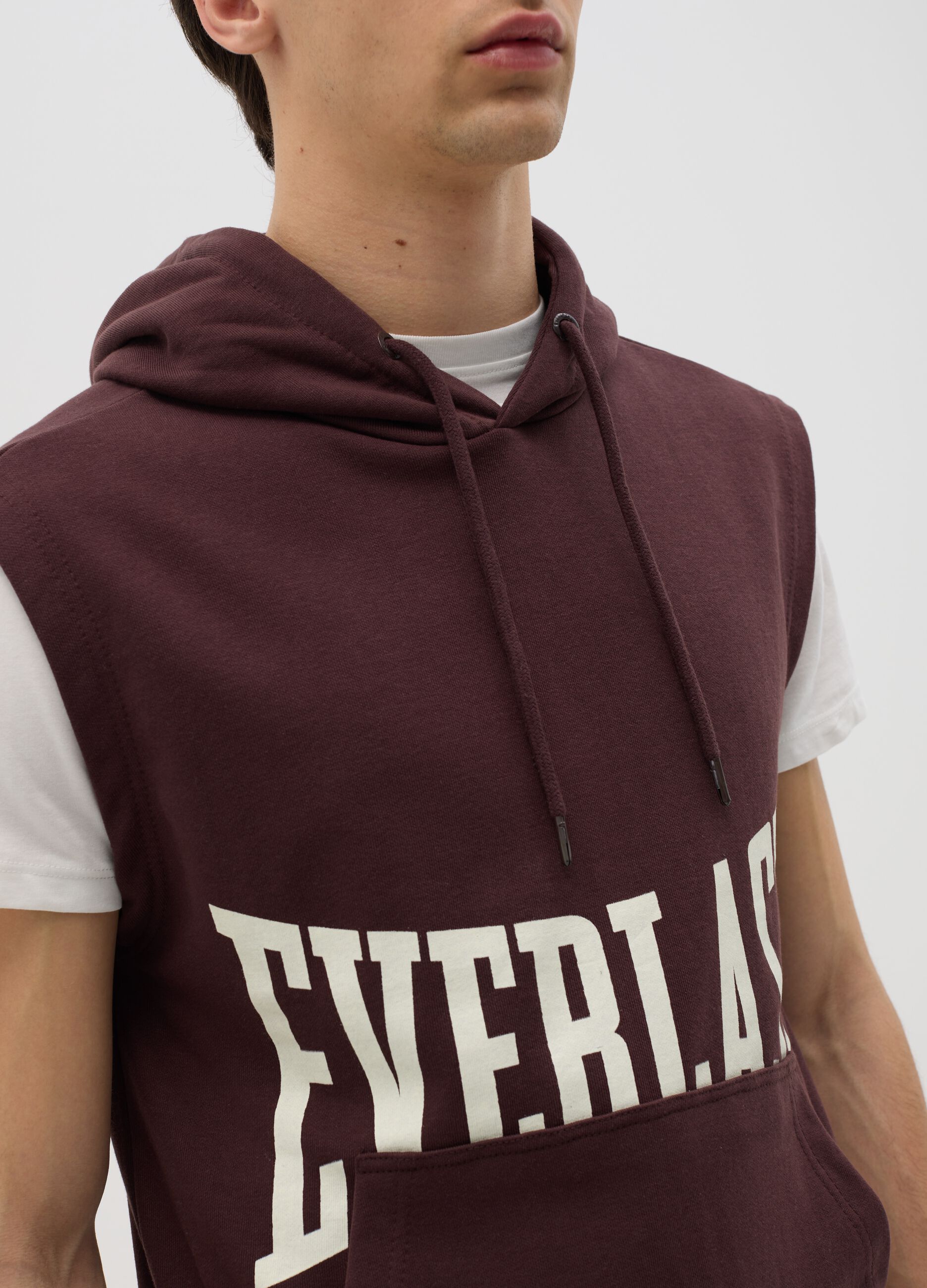 Brown sleeveless sweatshirt with print