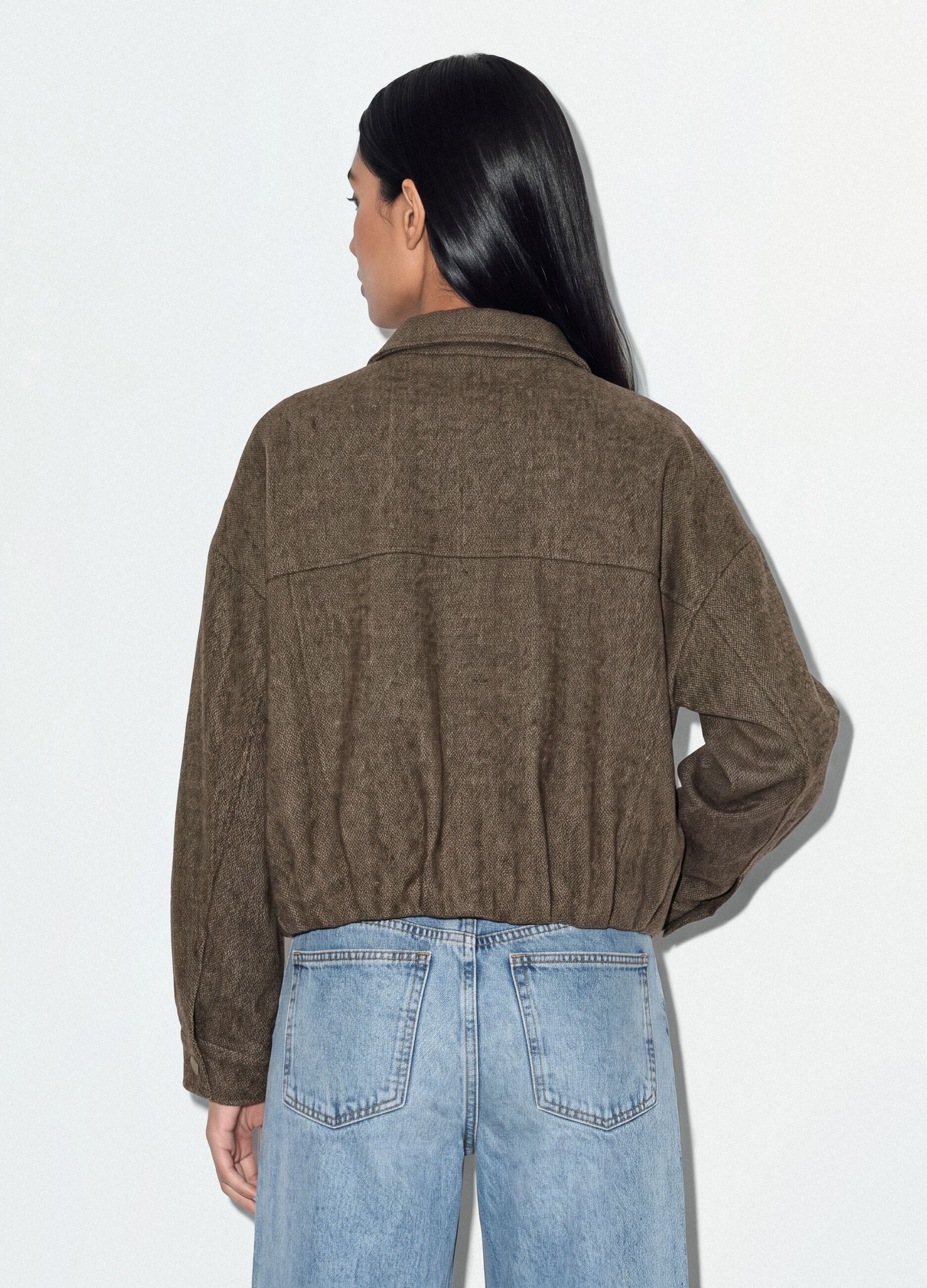 Giacca marrone regular con zip e fantasia spigata