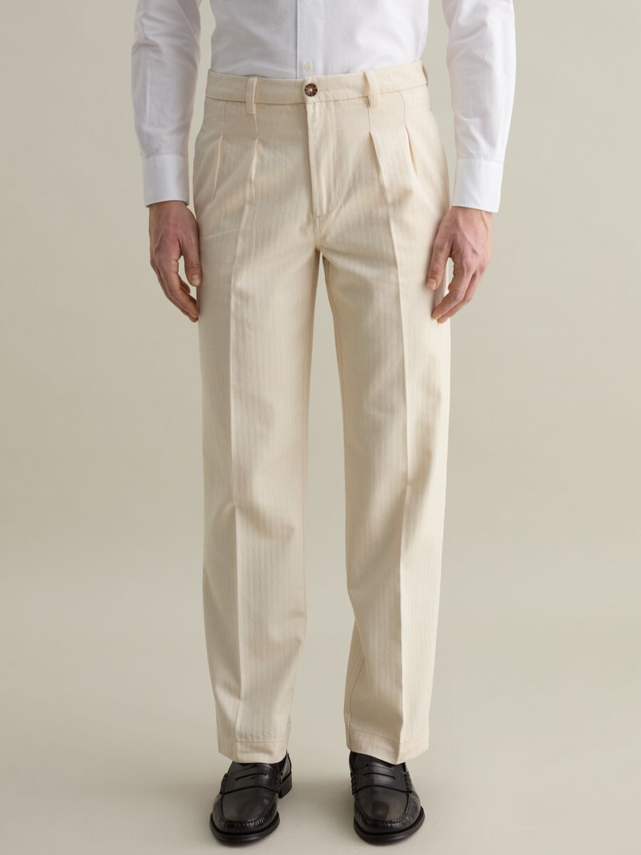 Pinstriped chino trousers with darts_1