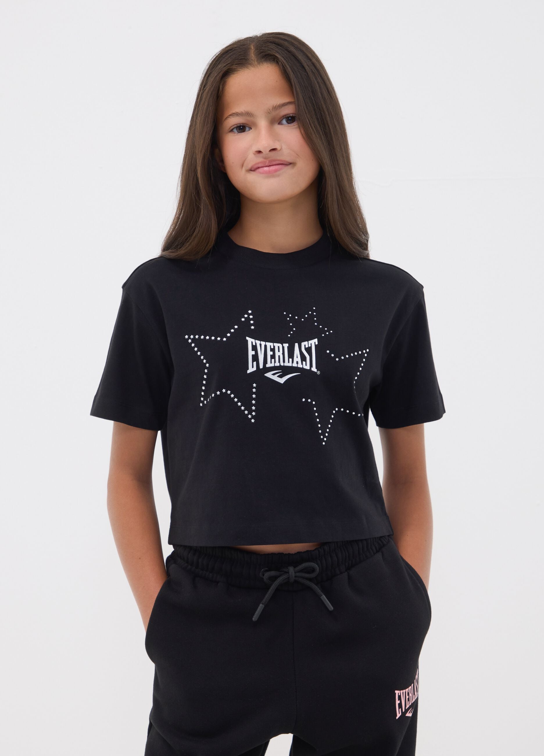 T-shirt nera cropped in puro cotone con stelle applicate per ragazza