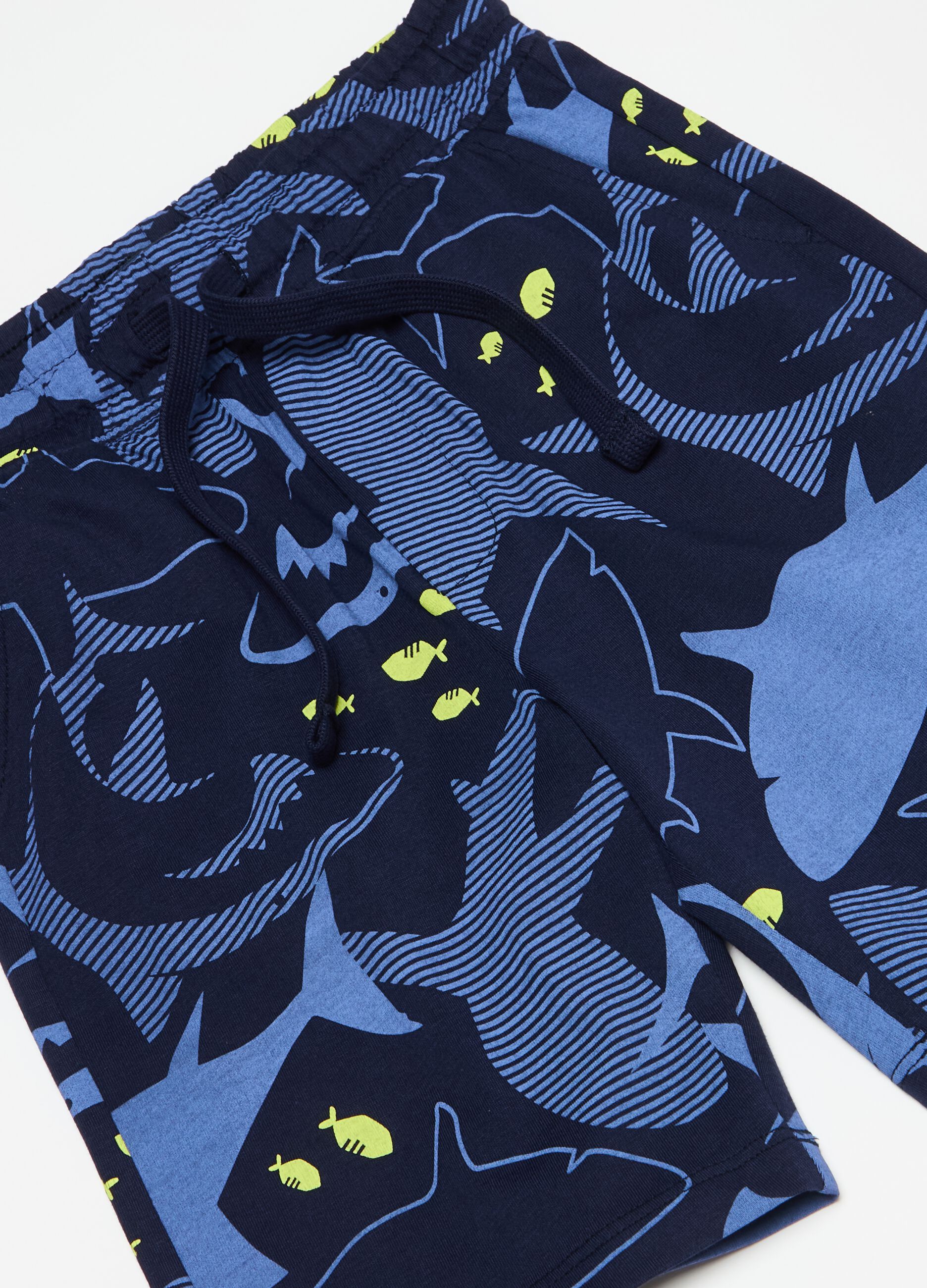Bermuda joggers with sharks print