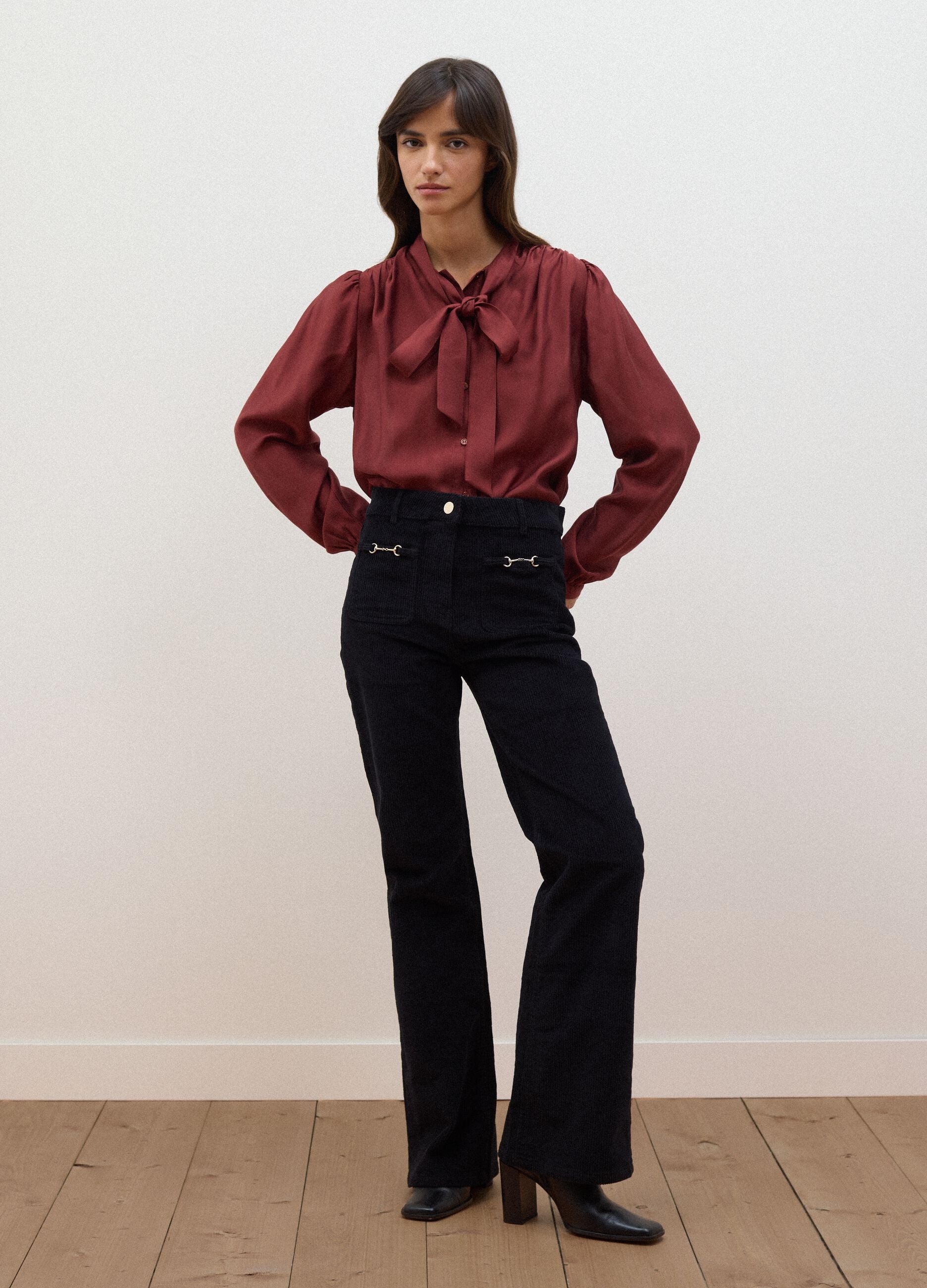 Black ribbed stretch-cotton flared trousers