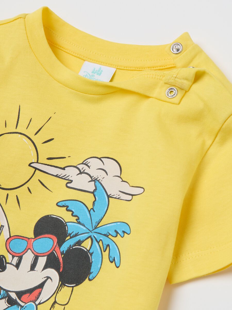 Disney outfit with yellow top and short blue trousers_3