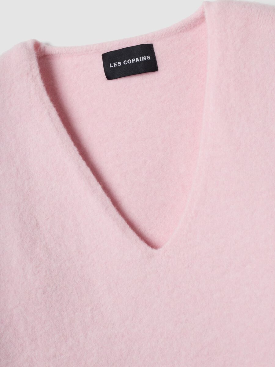 Pink stretch wool jumper with deep V-neck and oversized fit_1