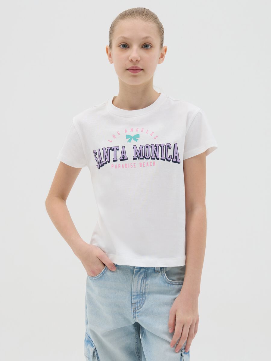 T-shirt bianca in cotone con stampa lettering_0