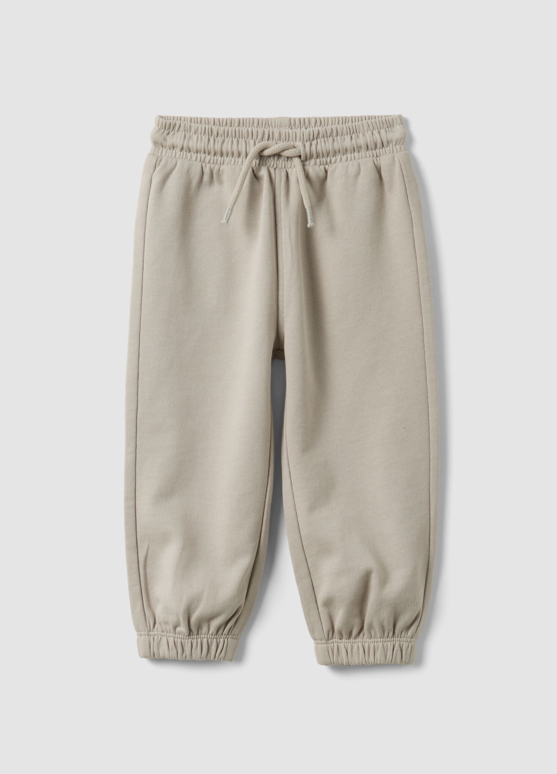 Grey jogger trousers in pure organic cotton with drawstring for baby boy
