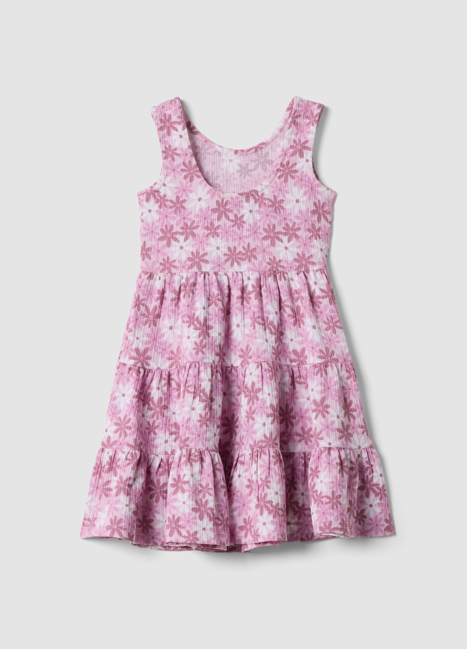 Pink sleeveless stretch dress with floral print